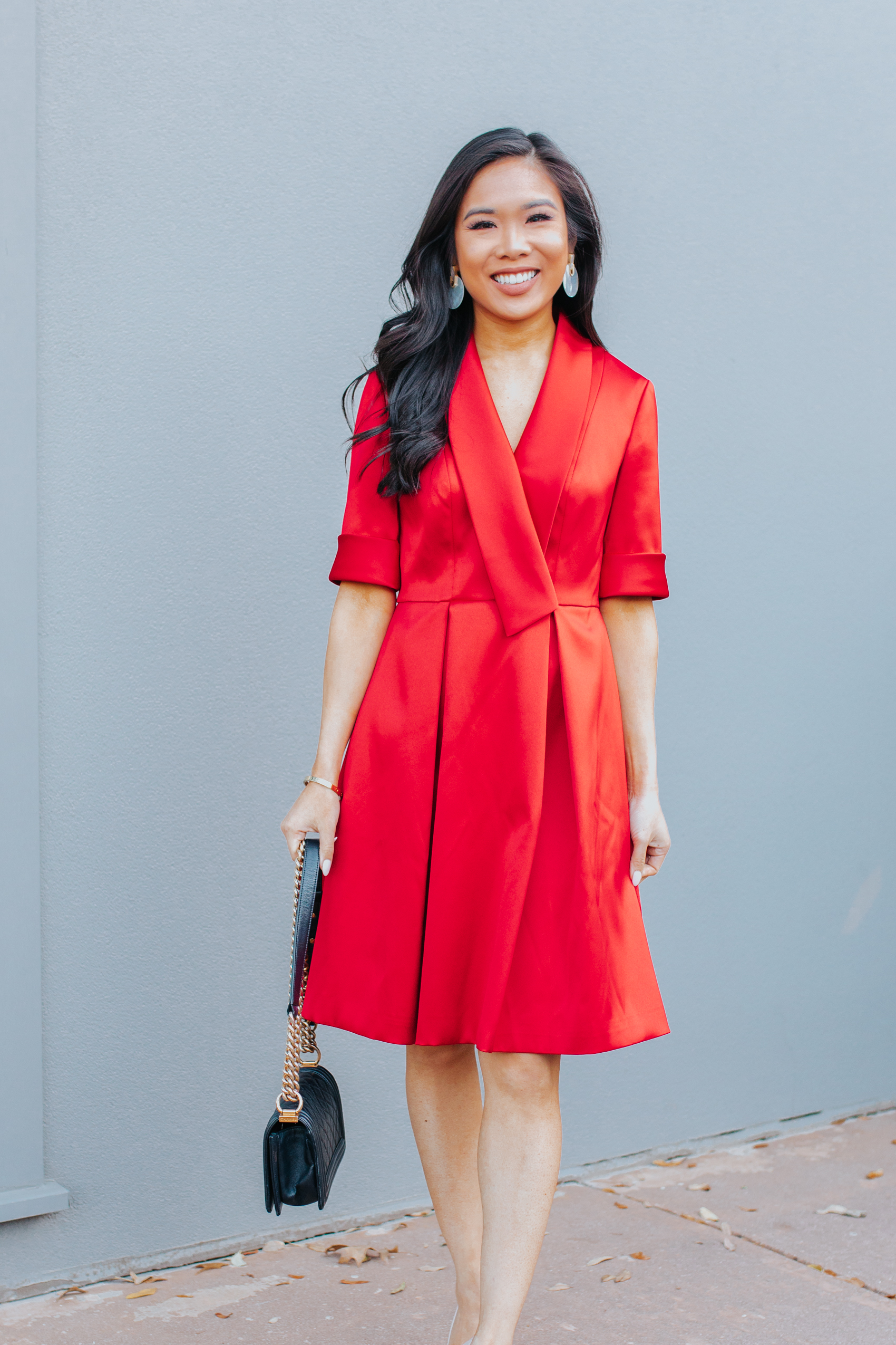 Blogger Hoang-Kim wears the Ruby Gal Meets Glam Dress and Kendra Scott Didi earrings