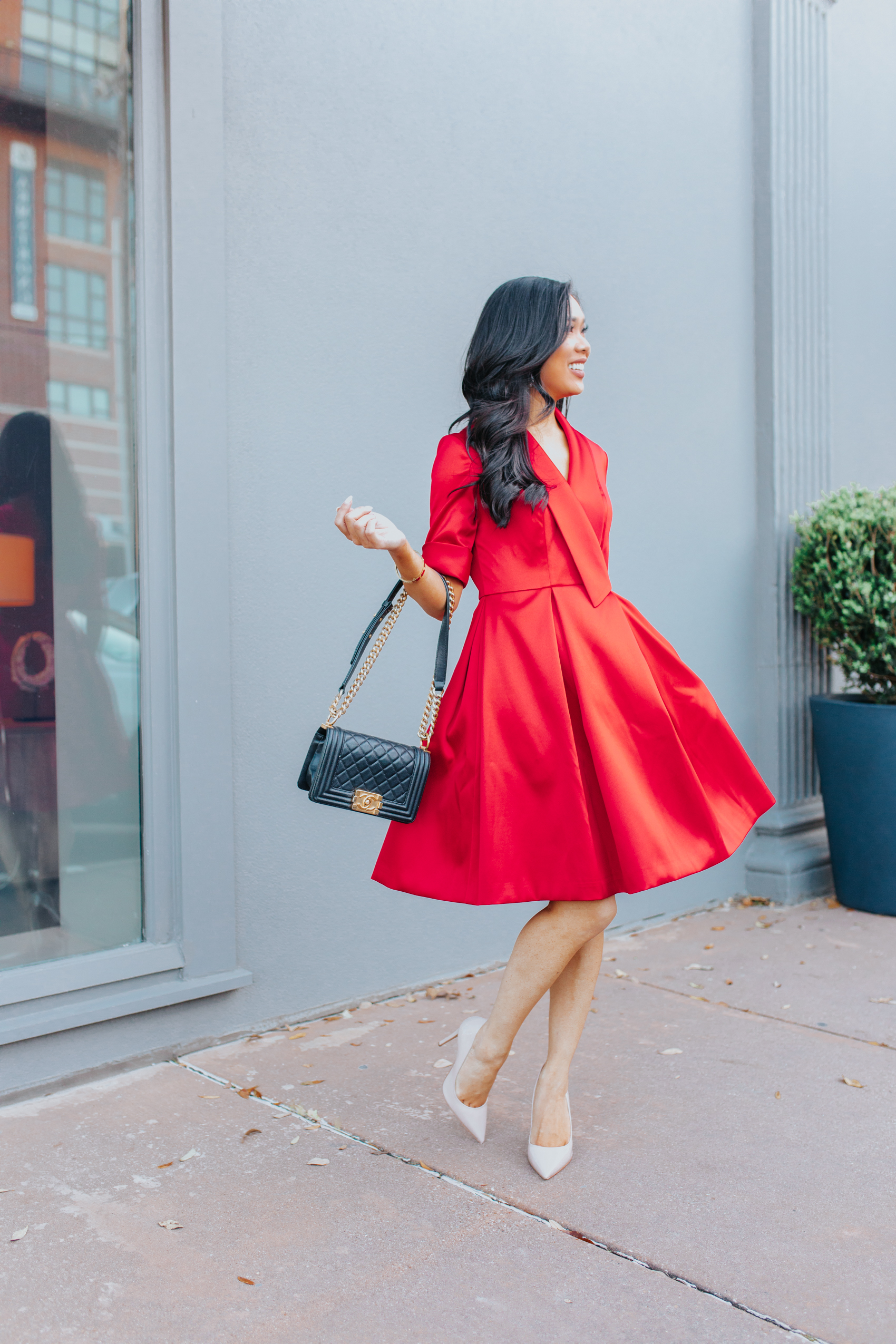Blogger Hoang-Kim wears a red dress with an oversized lapel