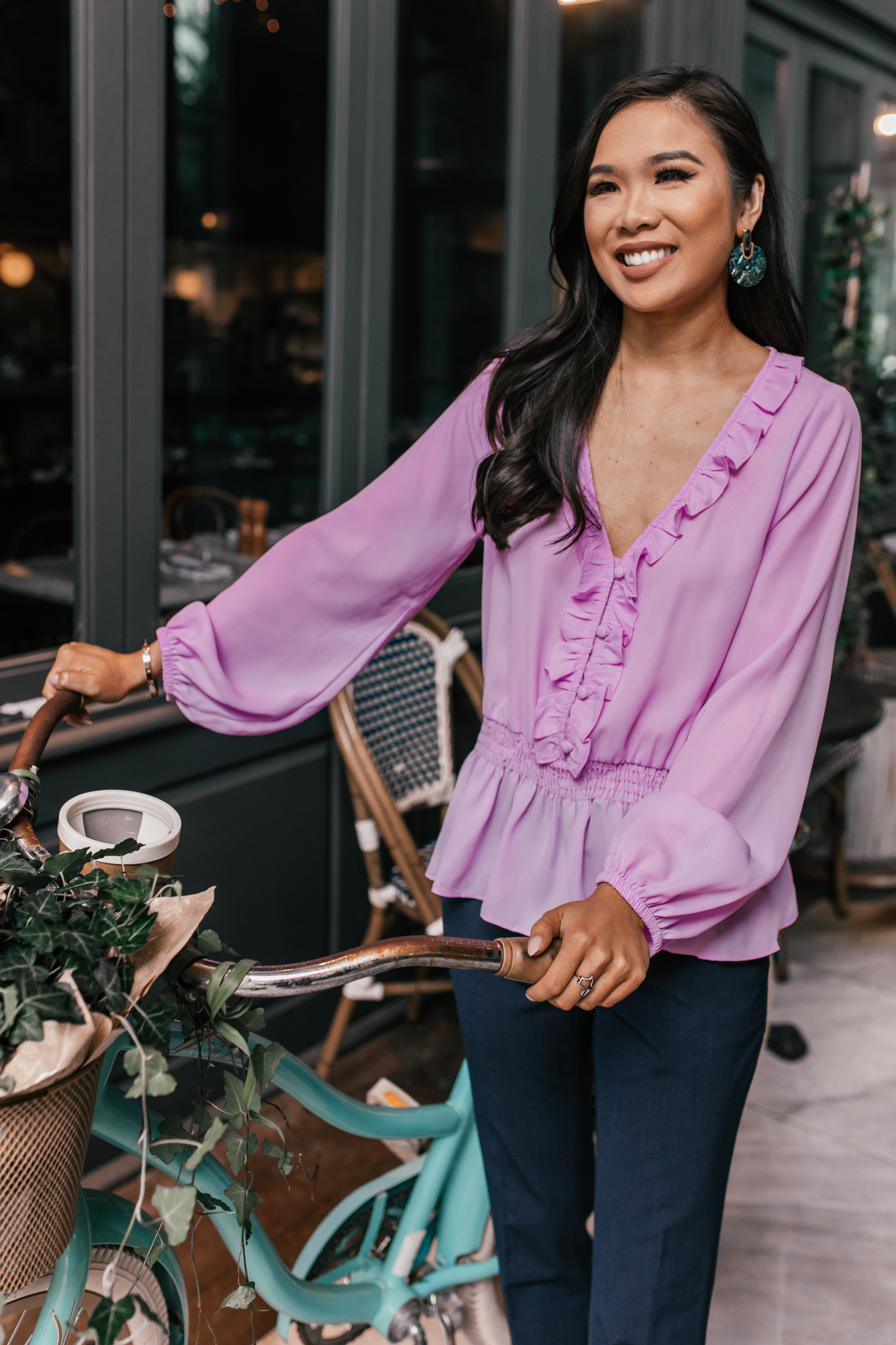 Hoang-Kim wears Roselyn's smock waist lavender top from the Gibson x IWD Collection