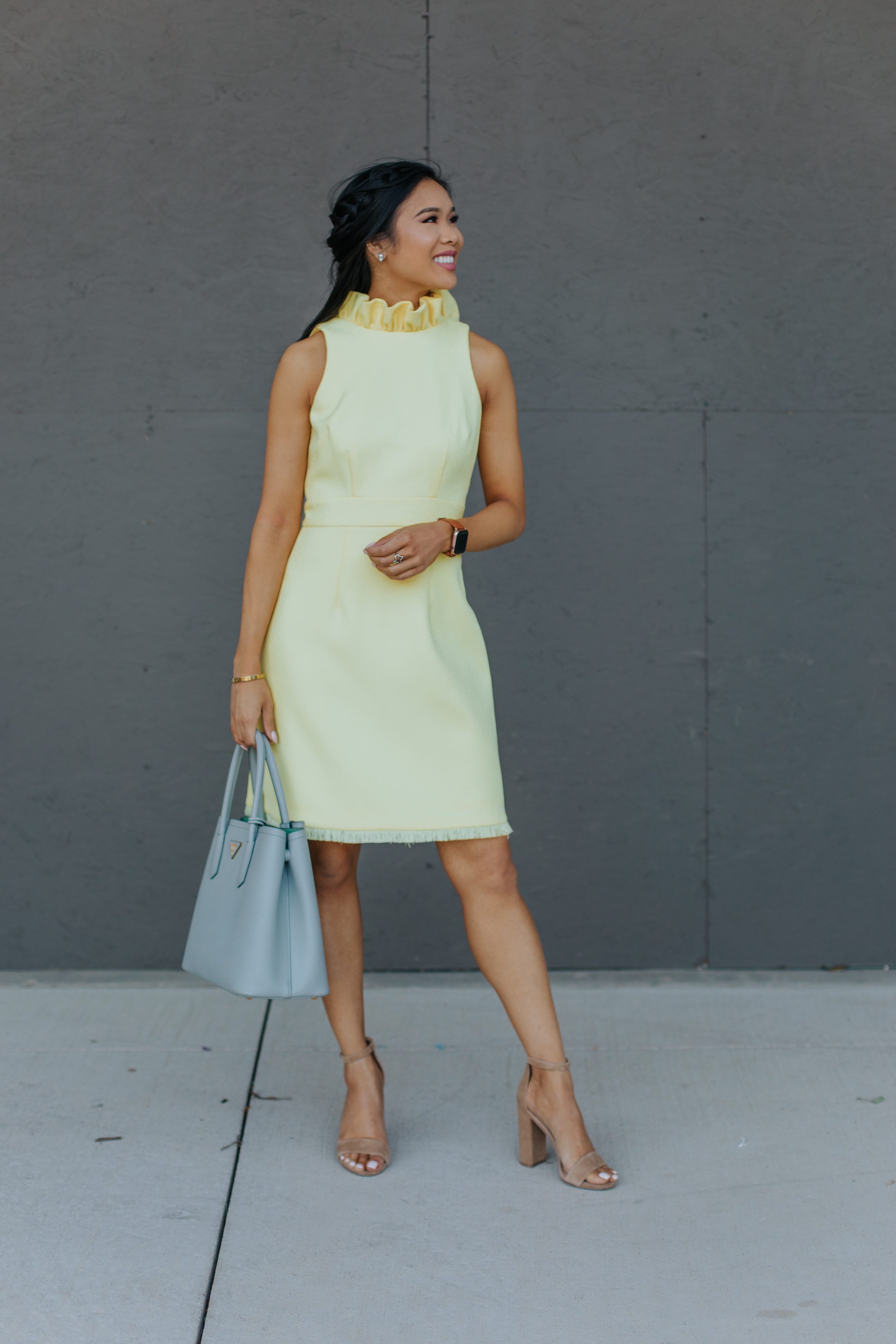 Blogger Hoang-Kim wears a yellow dress perfect for graduation or bridal showers
