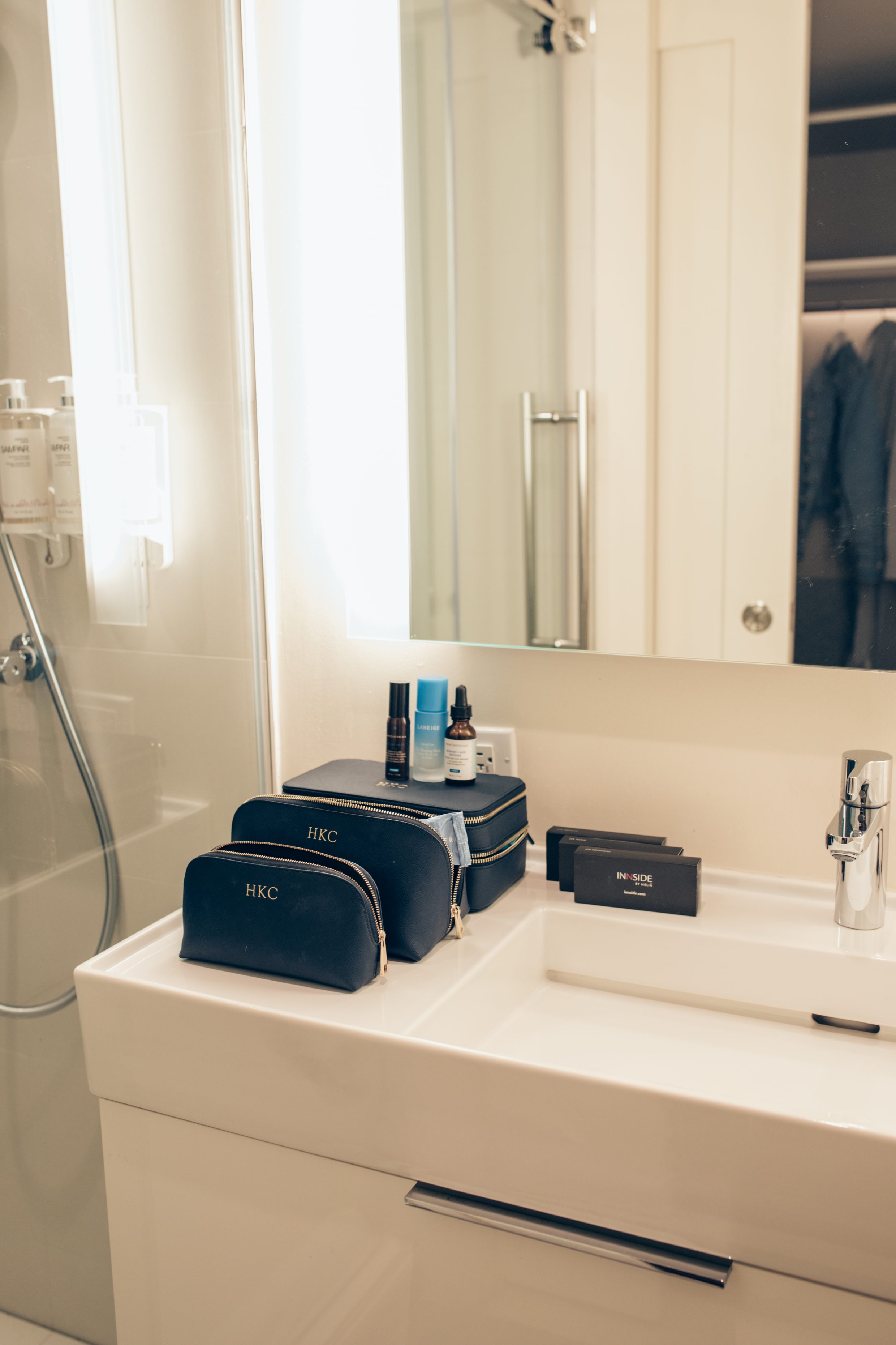 Travel pouches from The Daily Edited in the Bathroom at Innside New York Nomad