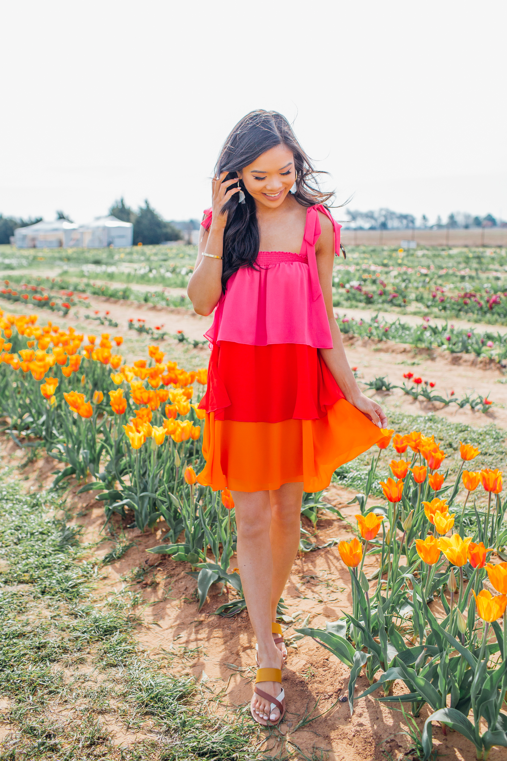 Blogger Hoang-Kim wearing a colorful dress at Texas Tulips in Pilot Point