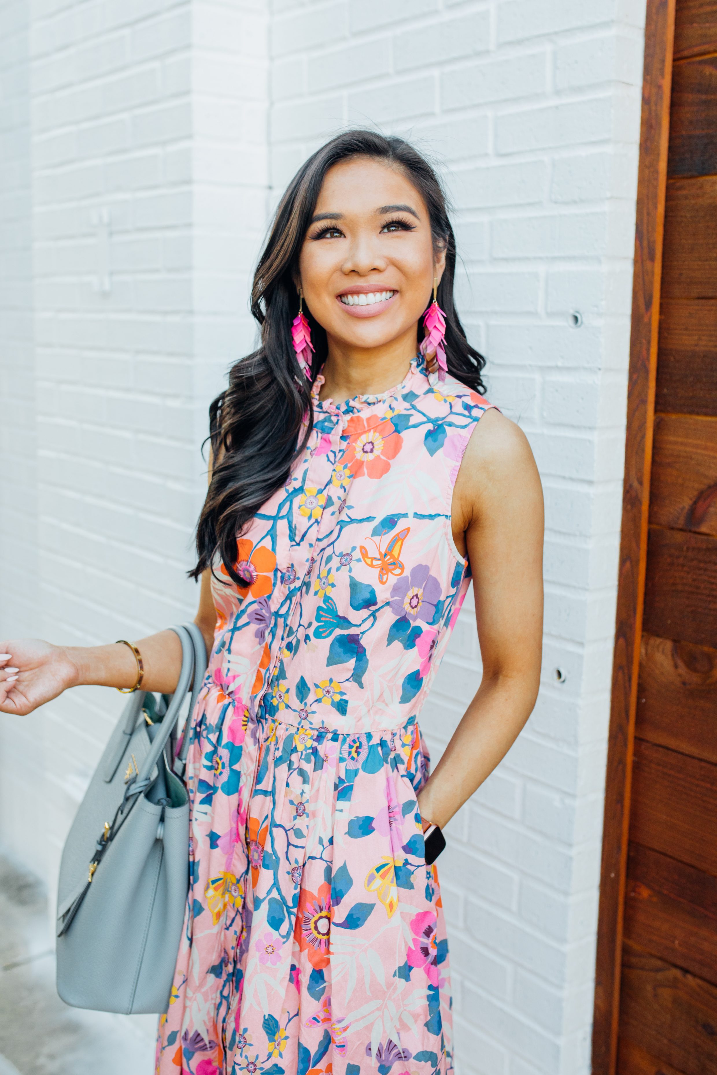 Blogger Hoang-Kim shares a summer outfit idea with a floral shirtdress