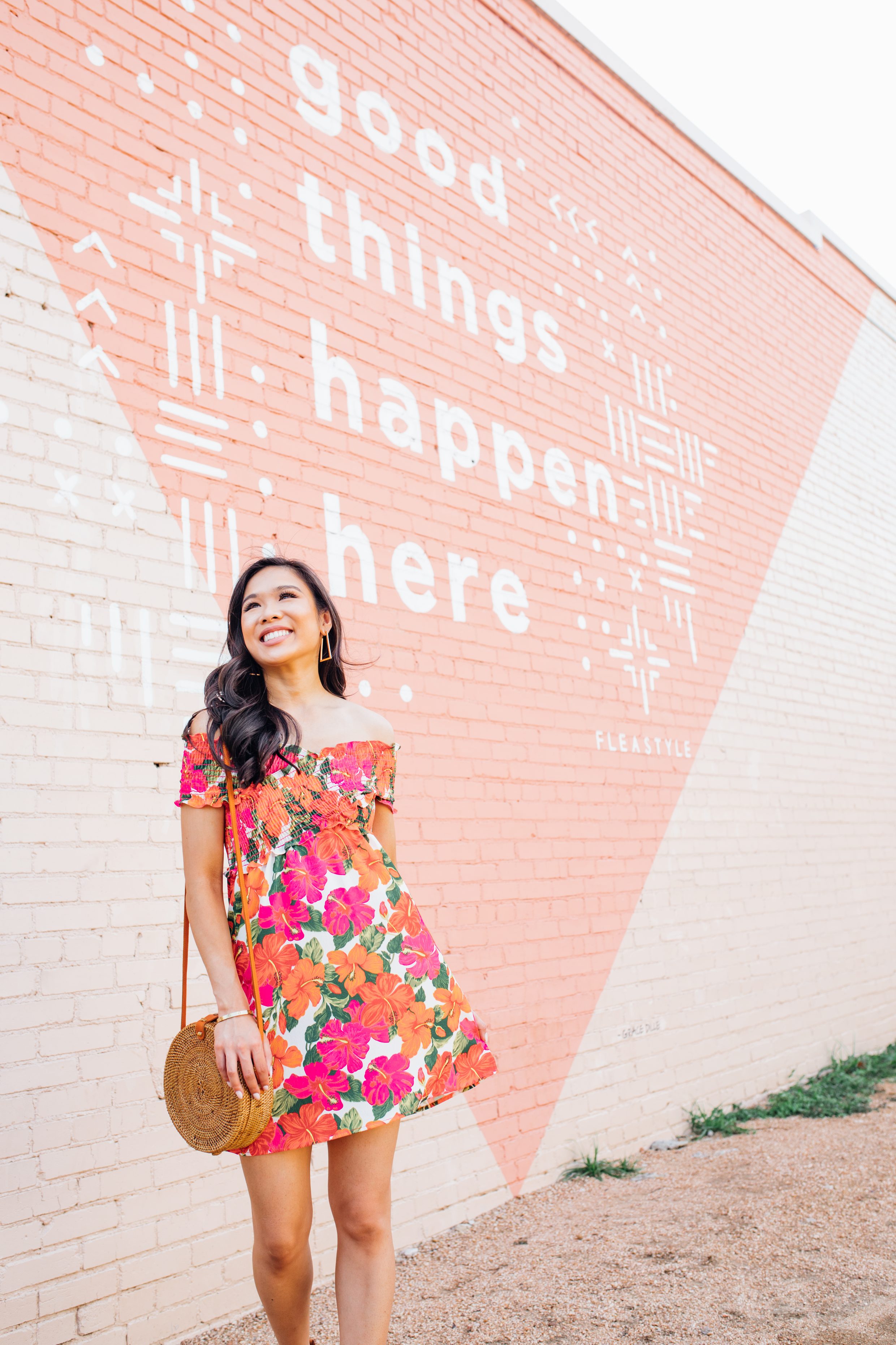 Blogger Hoang-Kim wears Kendra Scott Easton earrings with a Show Me Your Mumu tropical floral dress 
