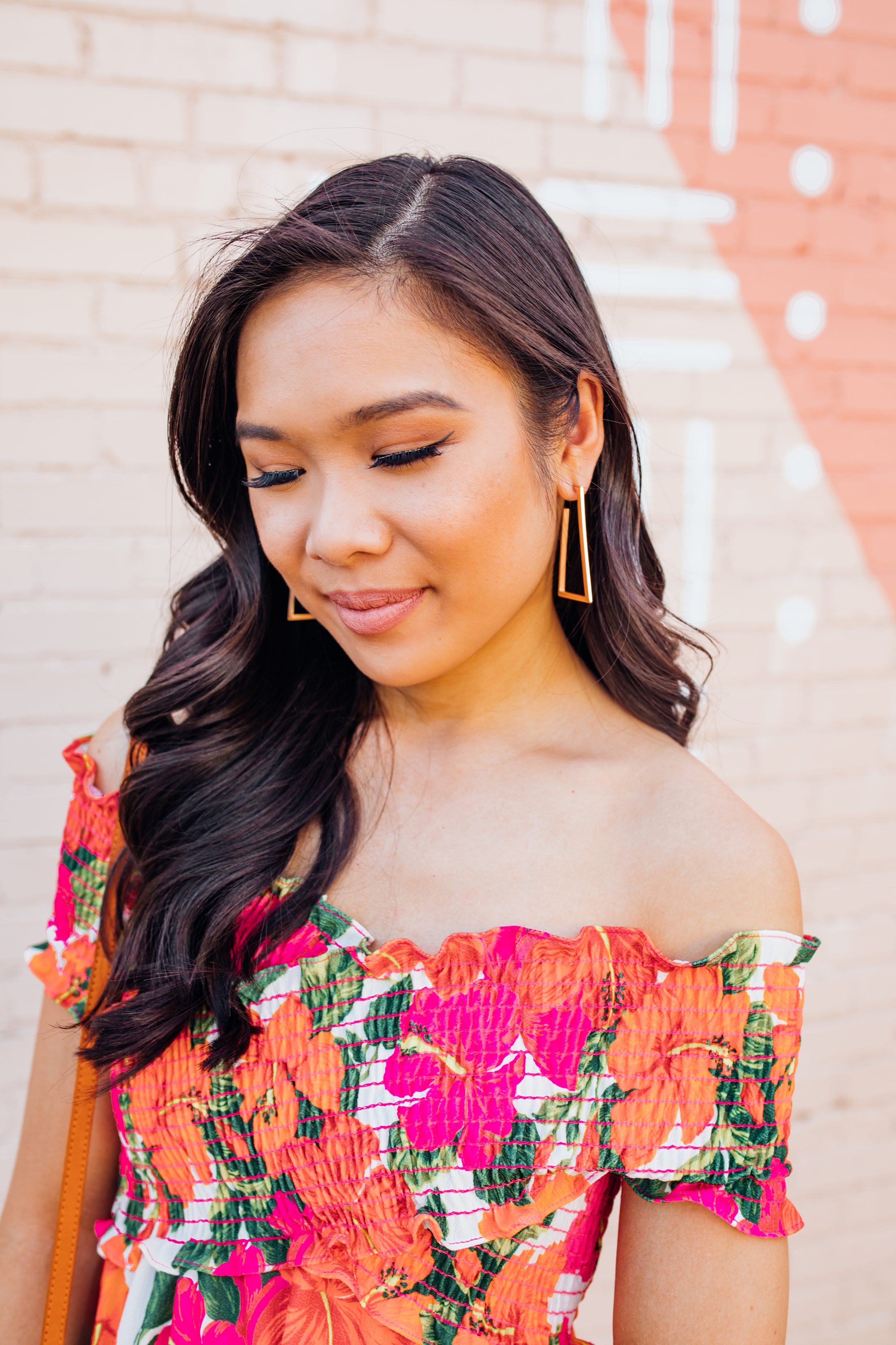 Blogger Hoang-Kim wears Kendra Scott Easton earrings in rose gold