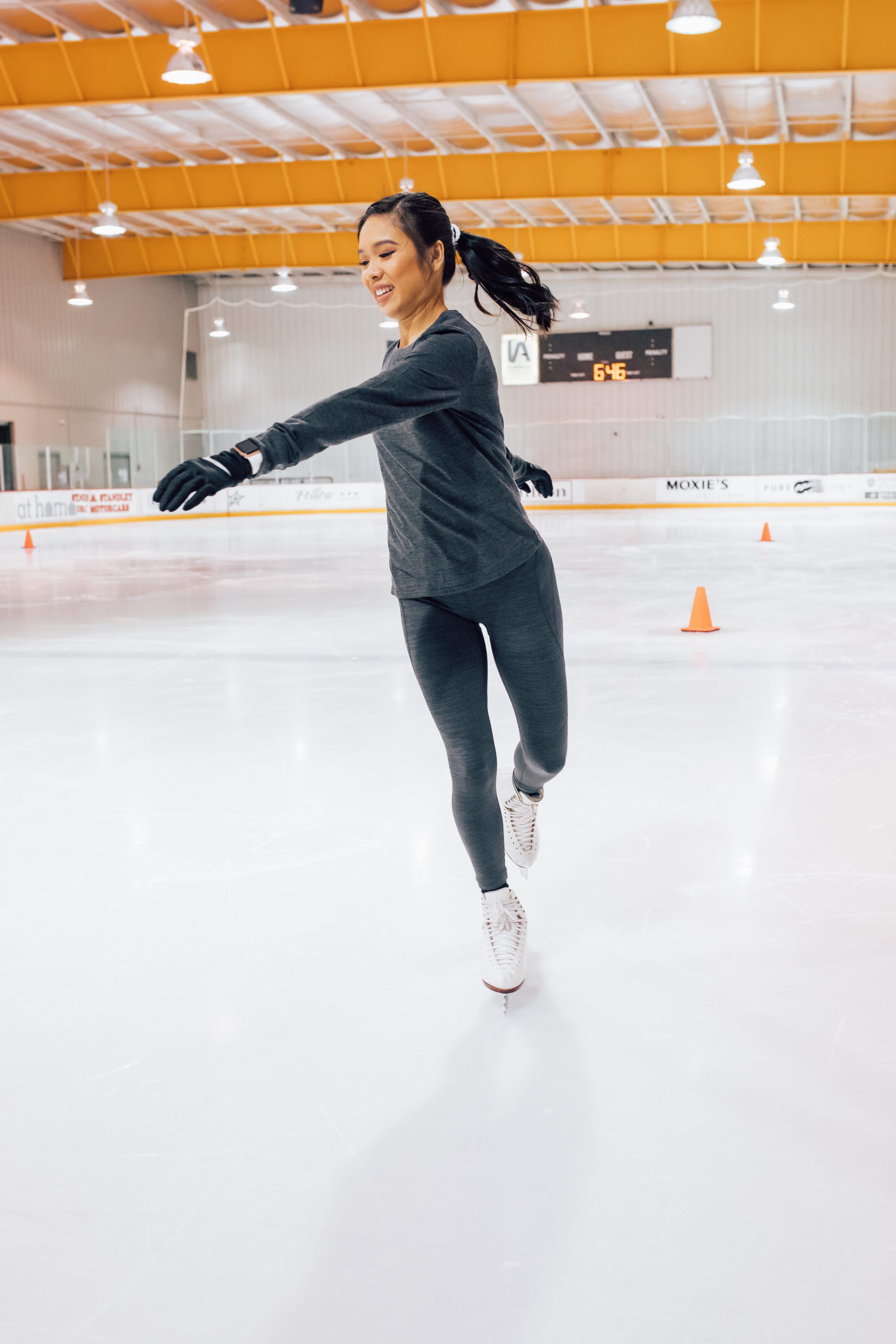 Adult figure skater Hoang-Kim wears outdoor voices tech sweat to the rink