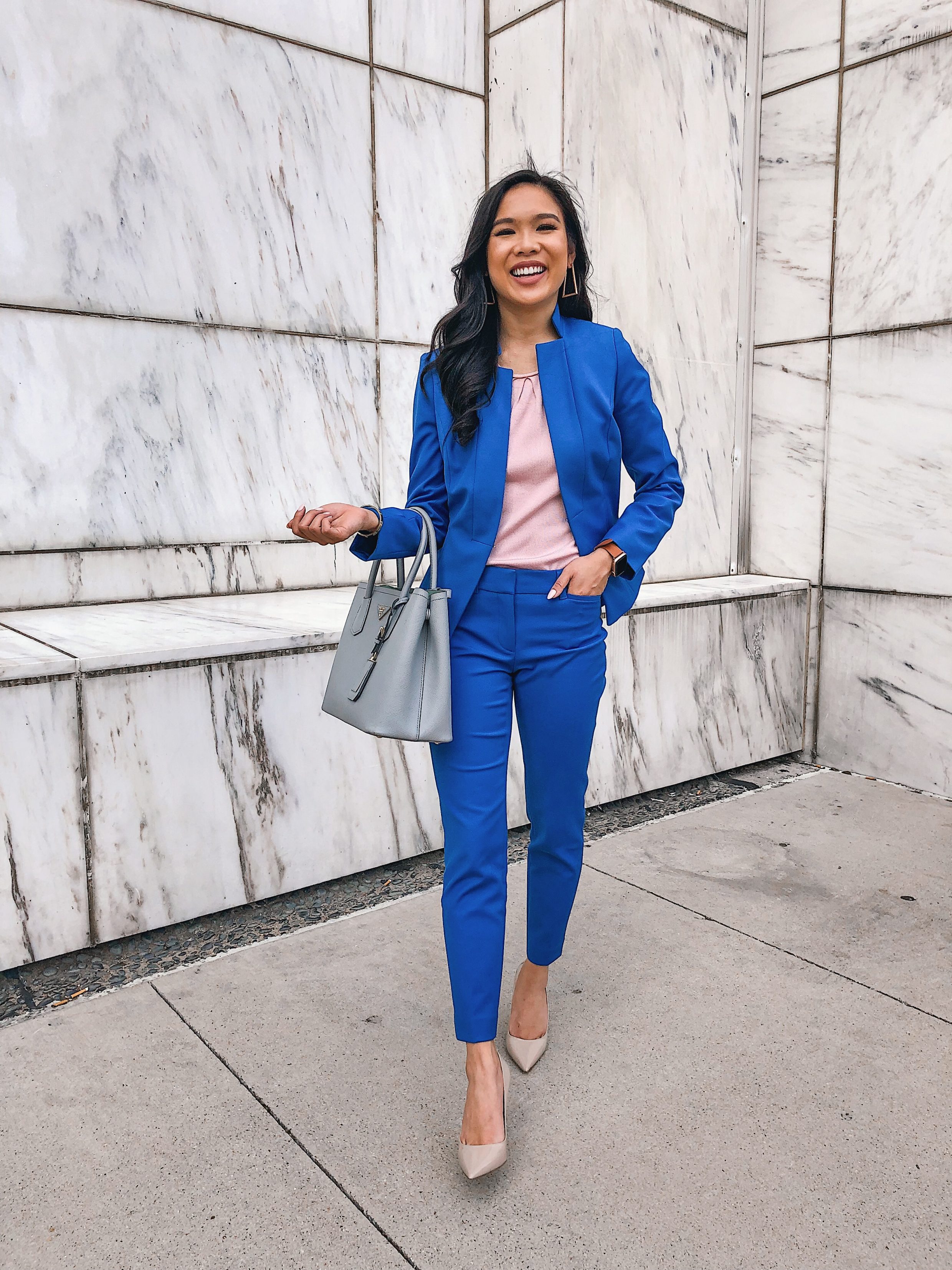 Blogger Hoang-Kim wears a blue pant suit from White House Black Market