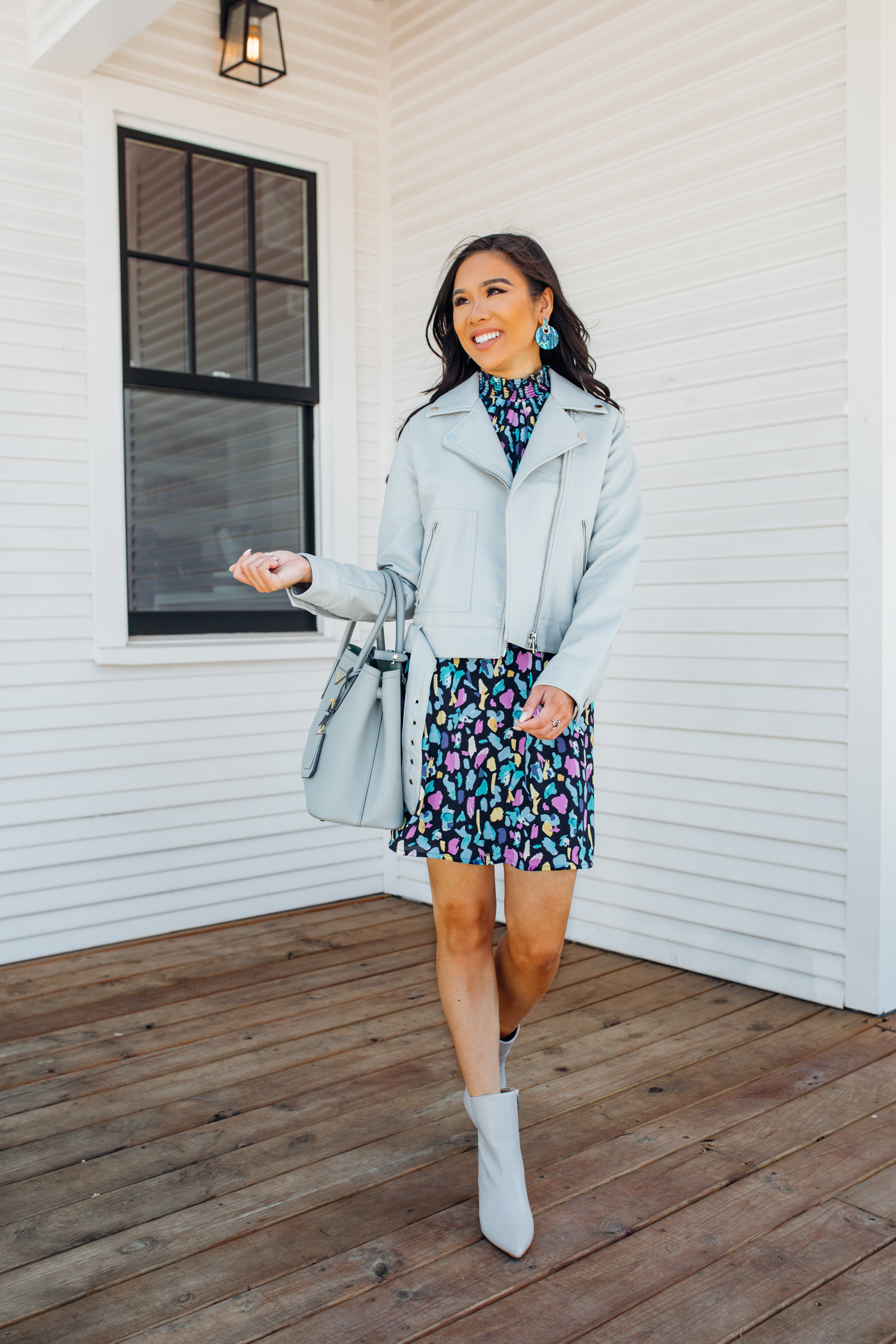 Petite blogger Hoang-Kim wears a Gibson City Safari dress with Topshop moto leather jacket, Marc Fisher unique booties and Kendra Scott Didi Earrings in Bishop Arts Dallas