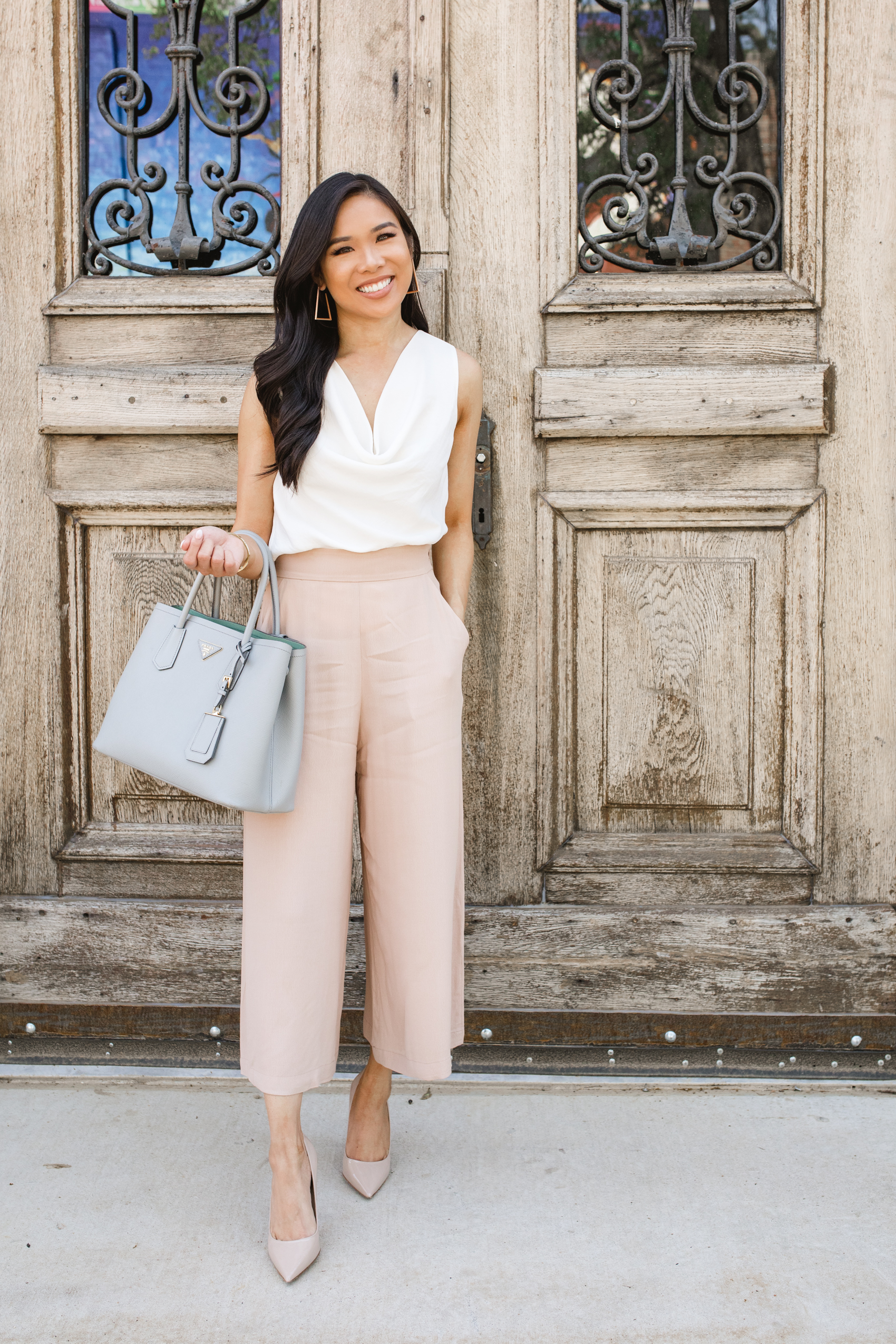 Workwear outfit inspo with nude wide-leg cropped pants, white blouse and nude heels