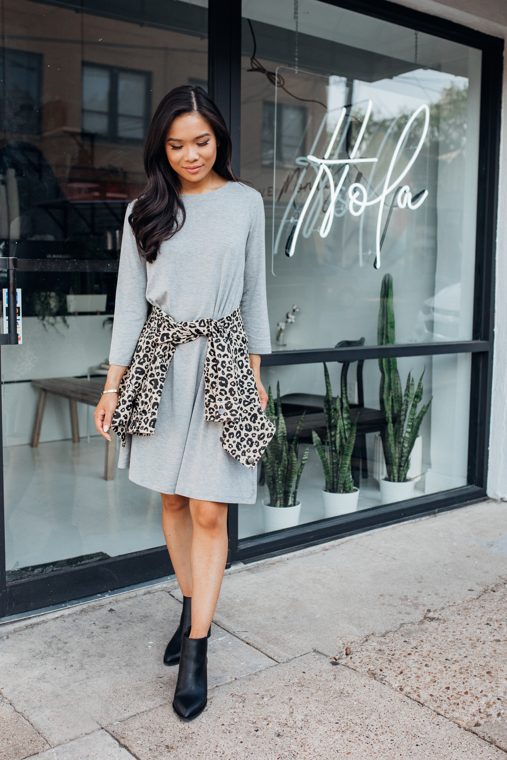 Affordable fall fashion with Walmart wearing a gray shirt dress, leopard jacket and black booties for a fall outfit