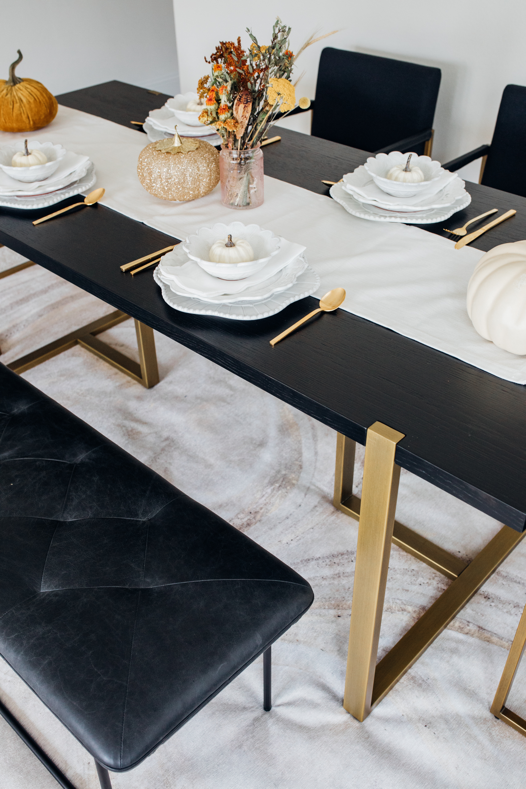 Thanksgiving Tablescape with a dining table with gold legs