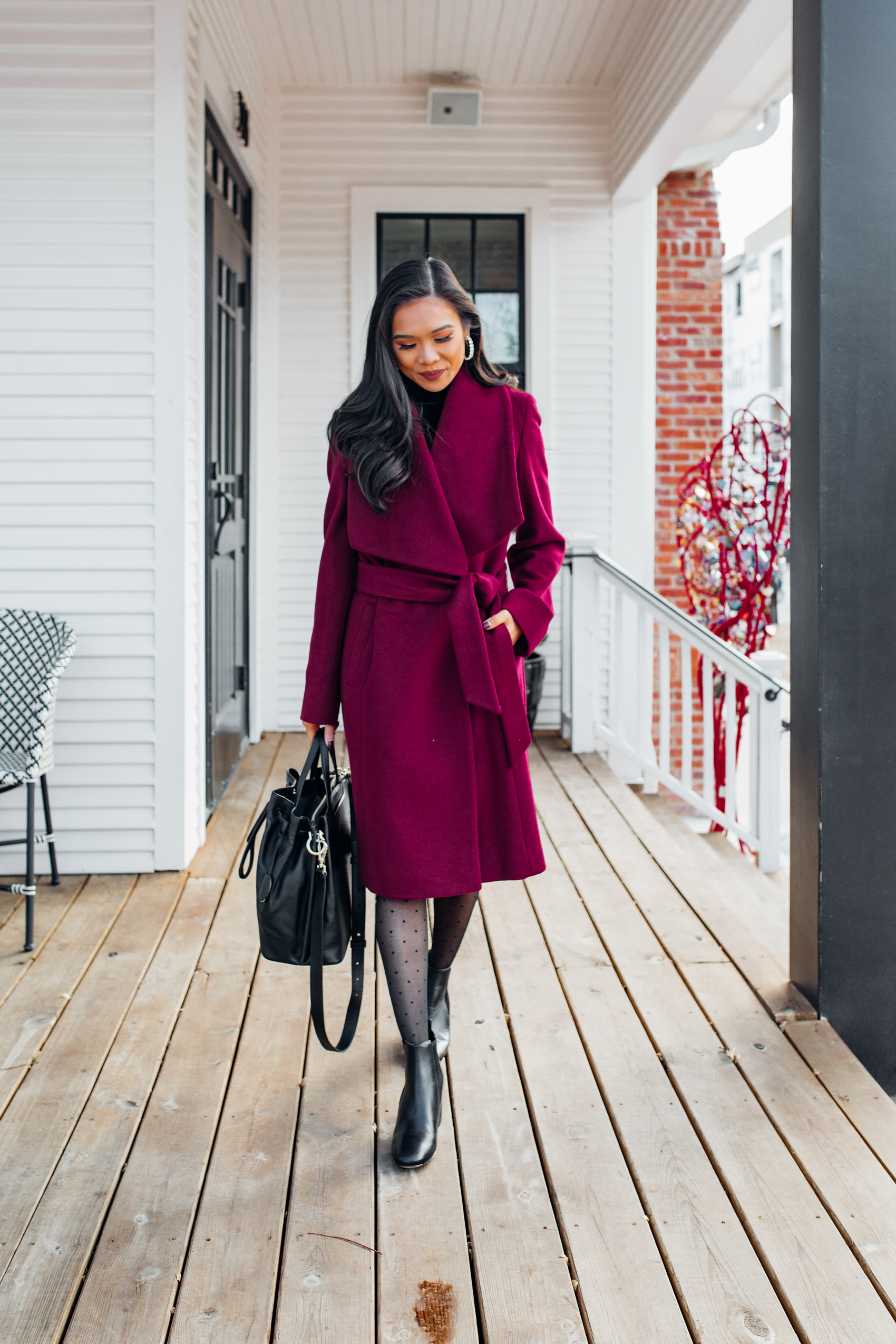 Luxury gifts for women without the price tag - Blogger Hoang-Kim styles a Cole Haan Wrap coat