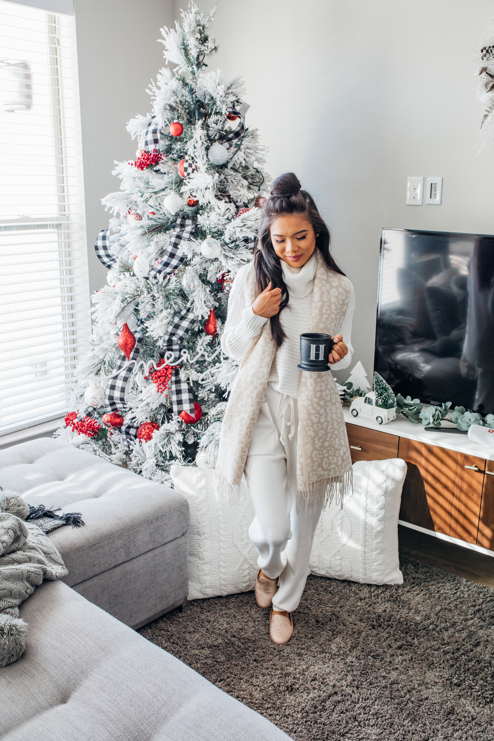 Winter lounge outfit for lazy days at home with gold slippers and flocked Christmas tree