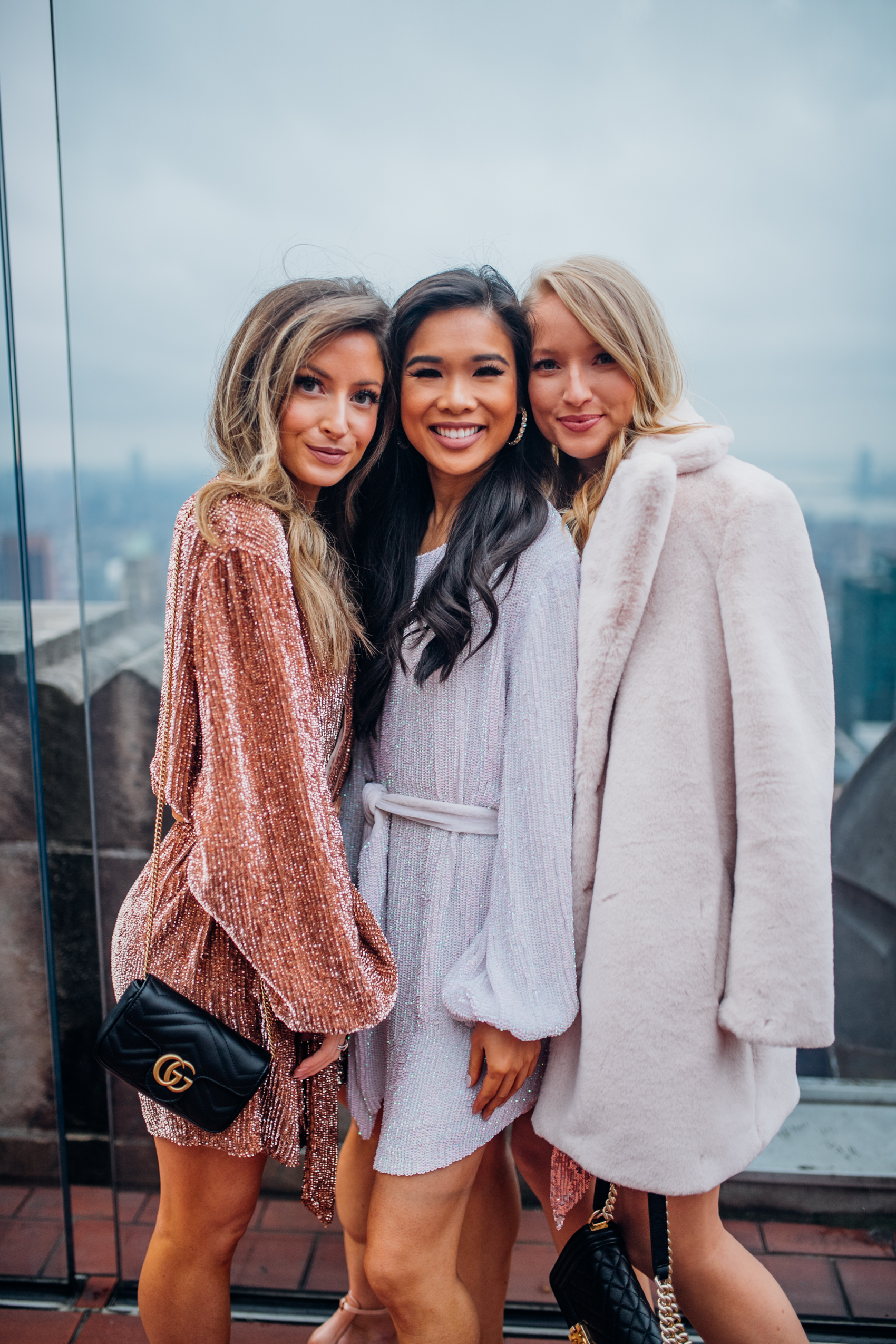 New Year's Eve Outfits with Retrofete dresses and a faux fur coat