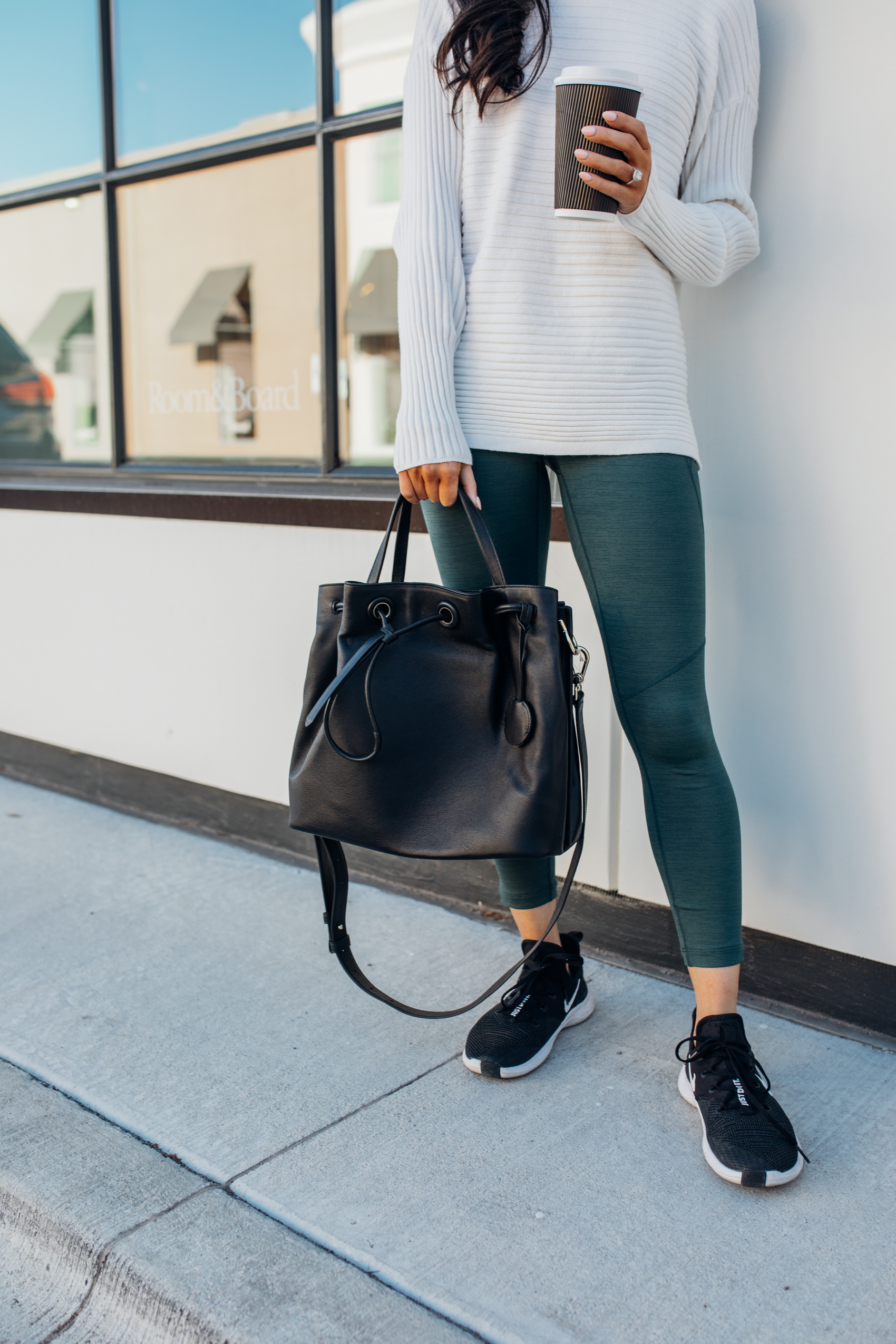 White ribbed sweater Outdoor voices 3/4 leggings Nike free tr8 sneakers cole haan grand ambition bucket bag athleisure outfit dallas fashion blogger Hoang-Kim