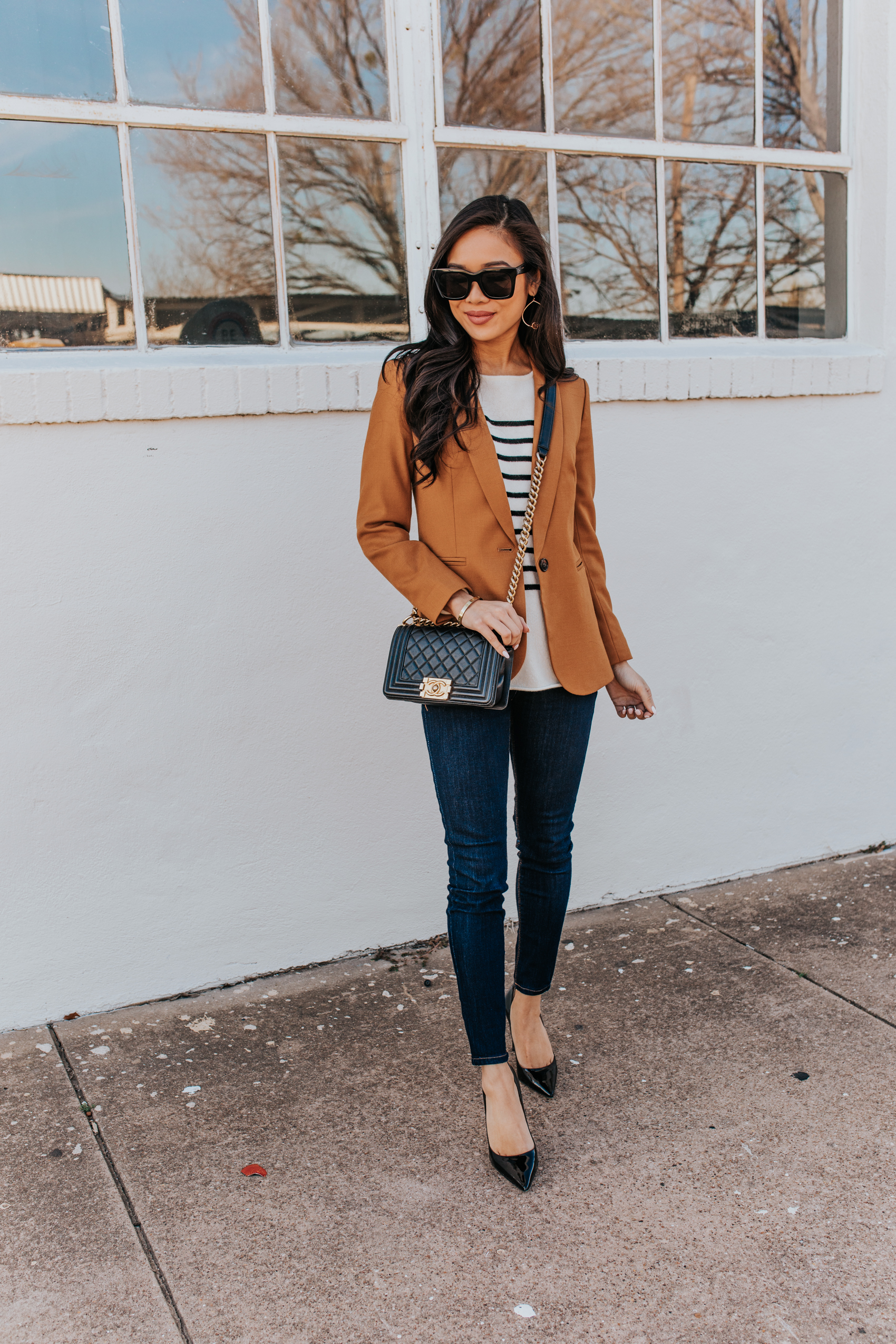 Work outfit for winter with a striped cashmere sweater wool blazer dark denim on petite blogger Hoang-Kim