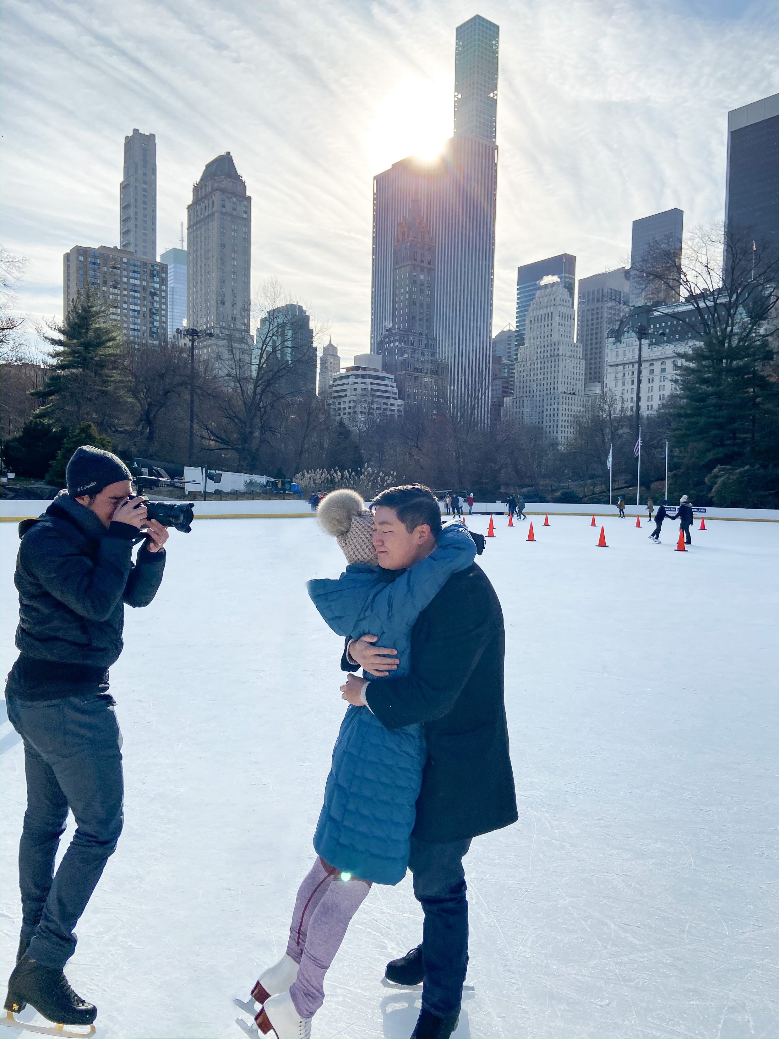 On ice videographer captures emotional surprise proposal while ice skating at central park in new york city