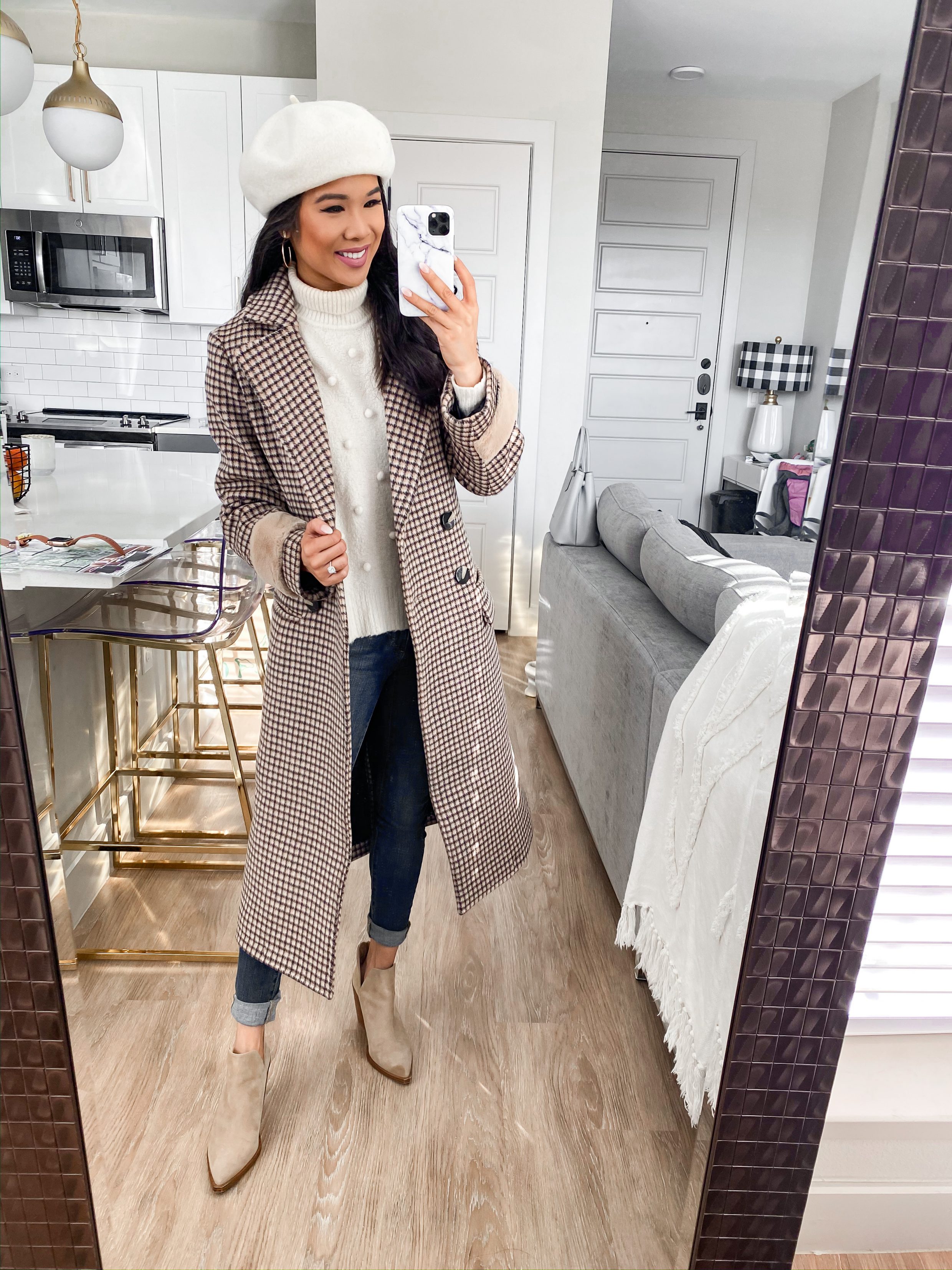 Plaid coat outfit for winter with an ivory beret, ivory Madewell knit sweater, jeans and Vince Camuto booties