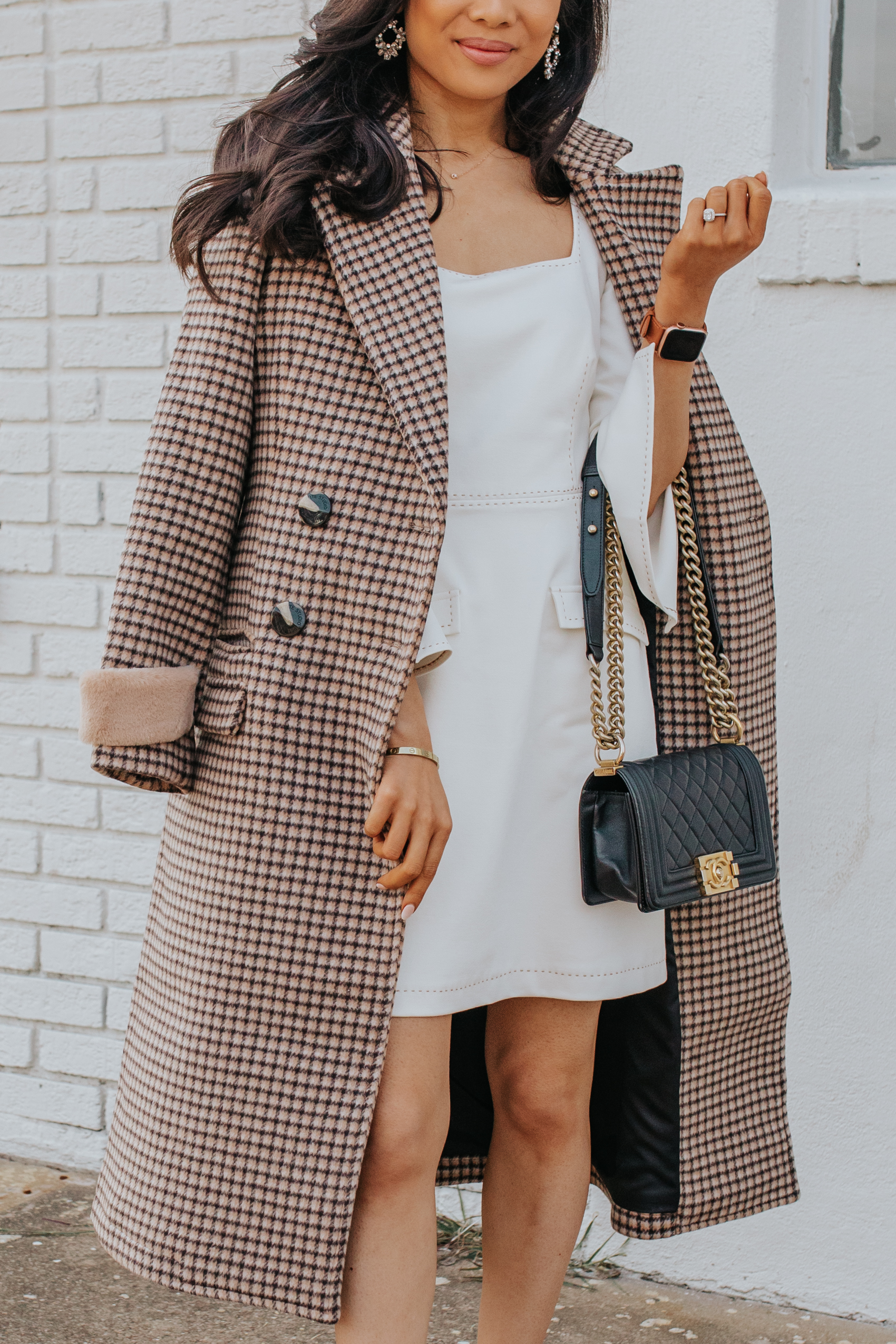 Plaid coat outfit with a white dress, olive + piper earrings and leather watch band on petite blogger Hoang-Kim