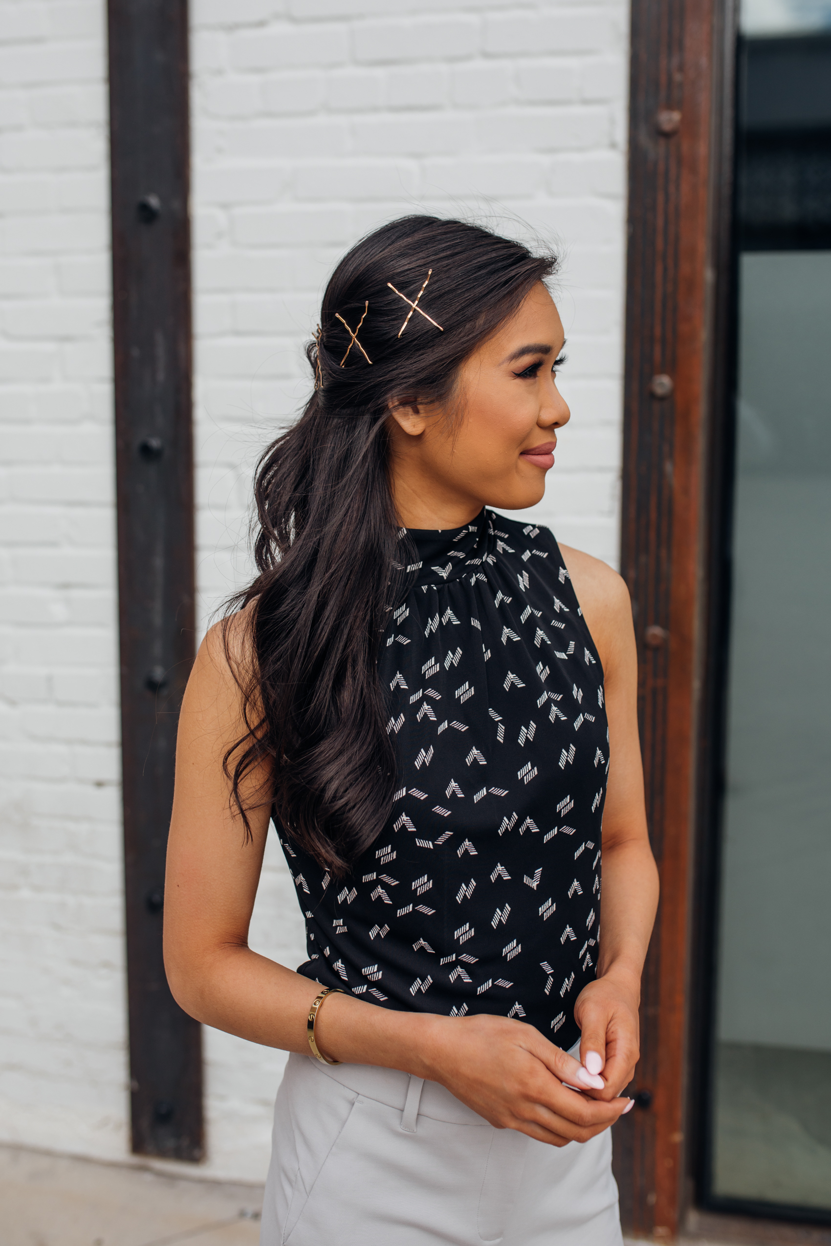 Work hairstyle with gold bobby pins in an X on petite blogger Hoang-Kim wearing spring workwear from White House Black Market