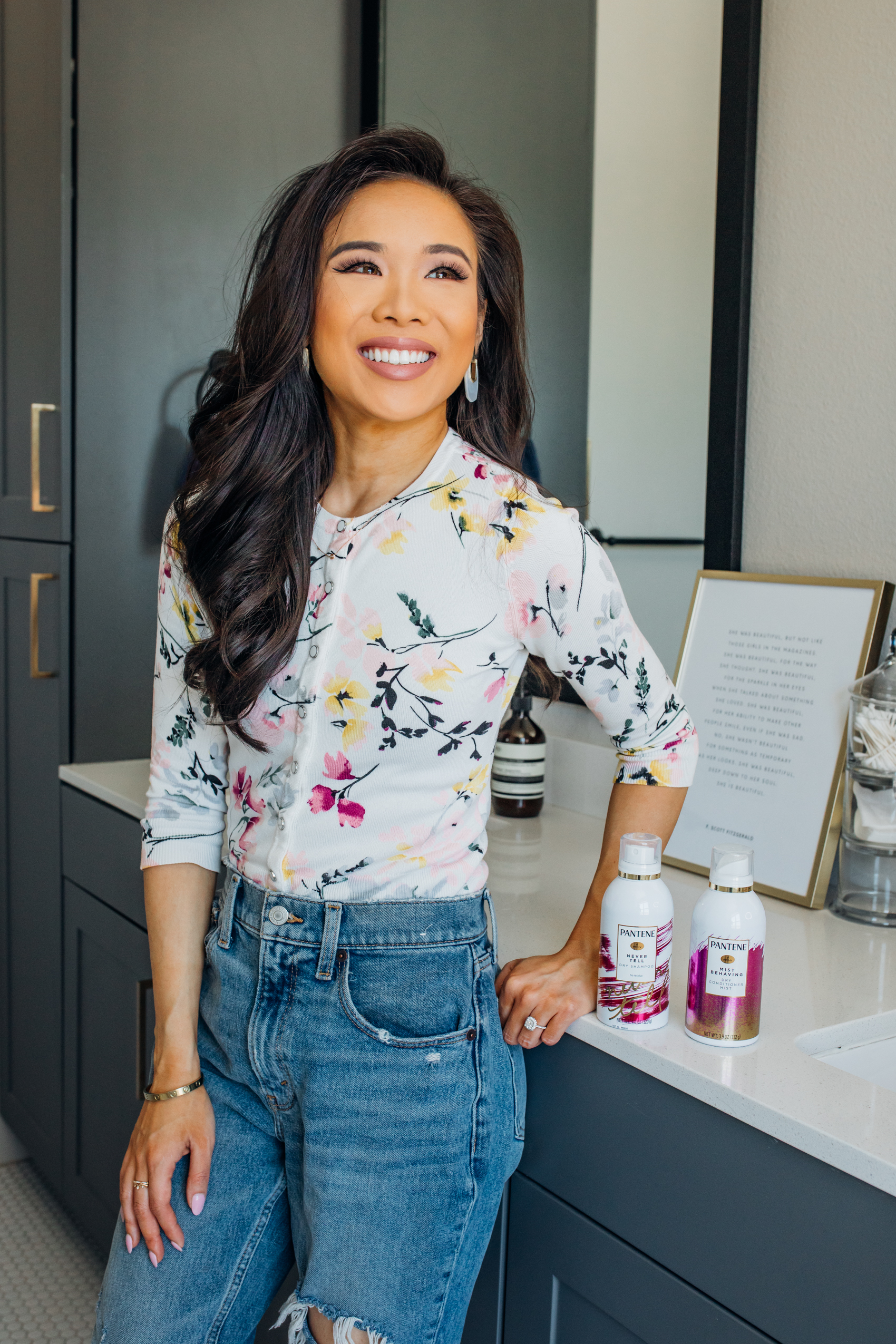 Blogger Hoang-Kim shares her favorite drugstore dry shampoo, Pantene Waterless wearing a floral WHBM Cardigan and mom jeans