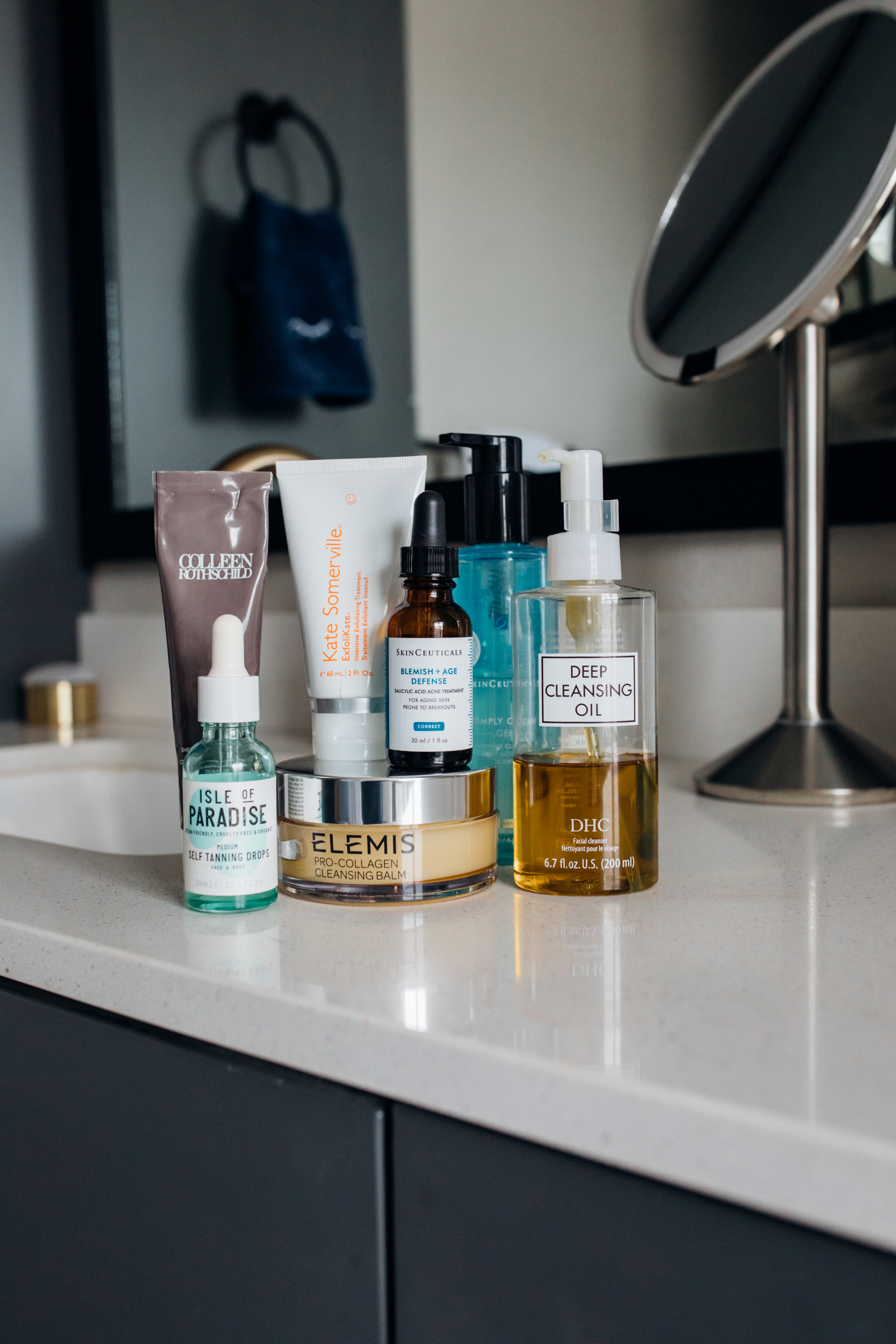 Nighttime skincare routine with Elemis cleansing balm, Skinceuticals blemish + age defense, DHC Cleasing oil, isle of paradise self tanner, Kate sommerville and more