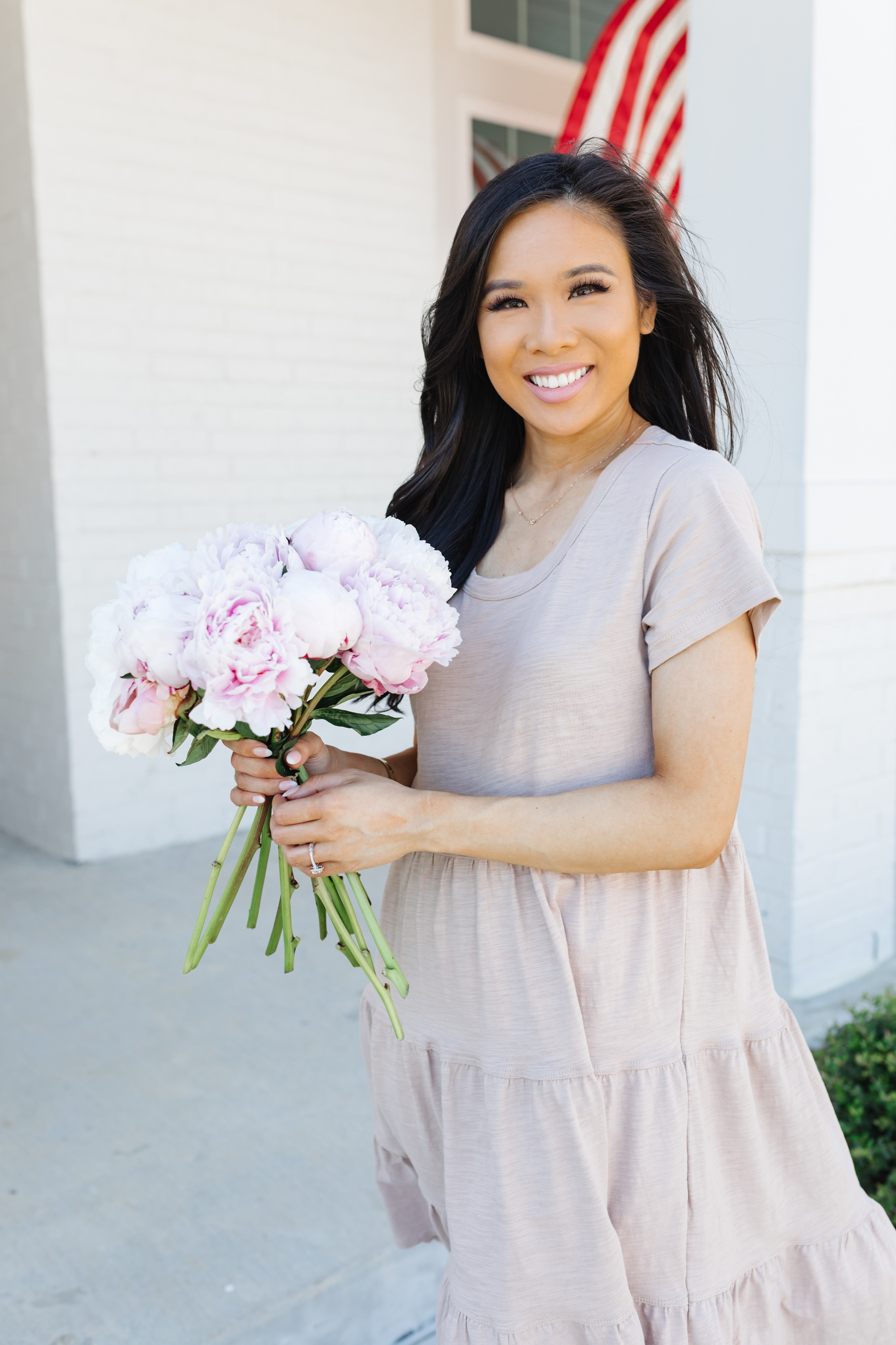 Blogger Hoang-Kim wearing a cotton tiered midi dress for summer outfits from Walmart Fashion