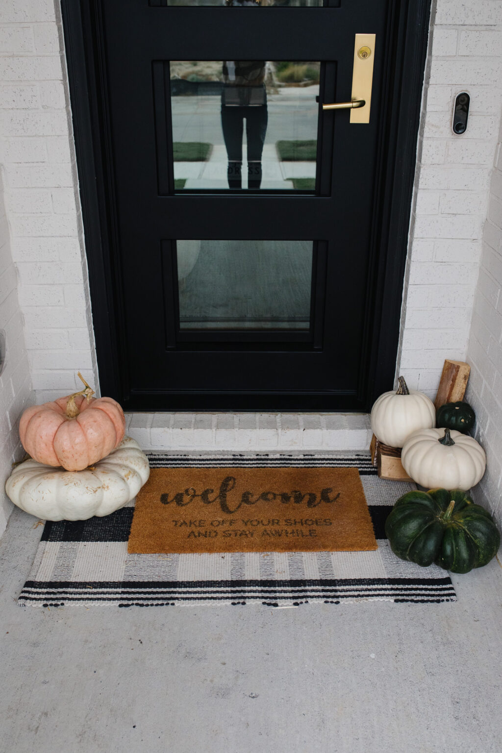 How to Decorate a Beautiful Fall Front Porch with Pumpkins - Color & Chic