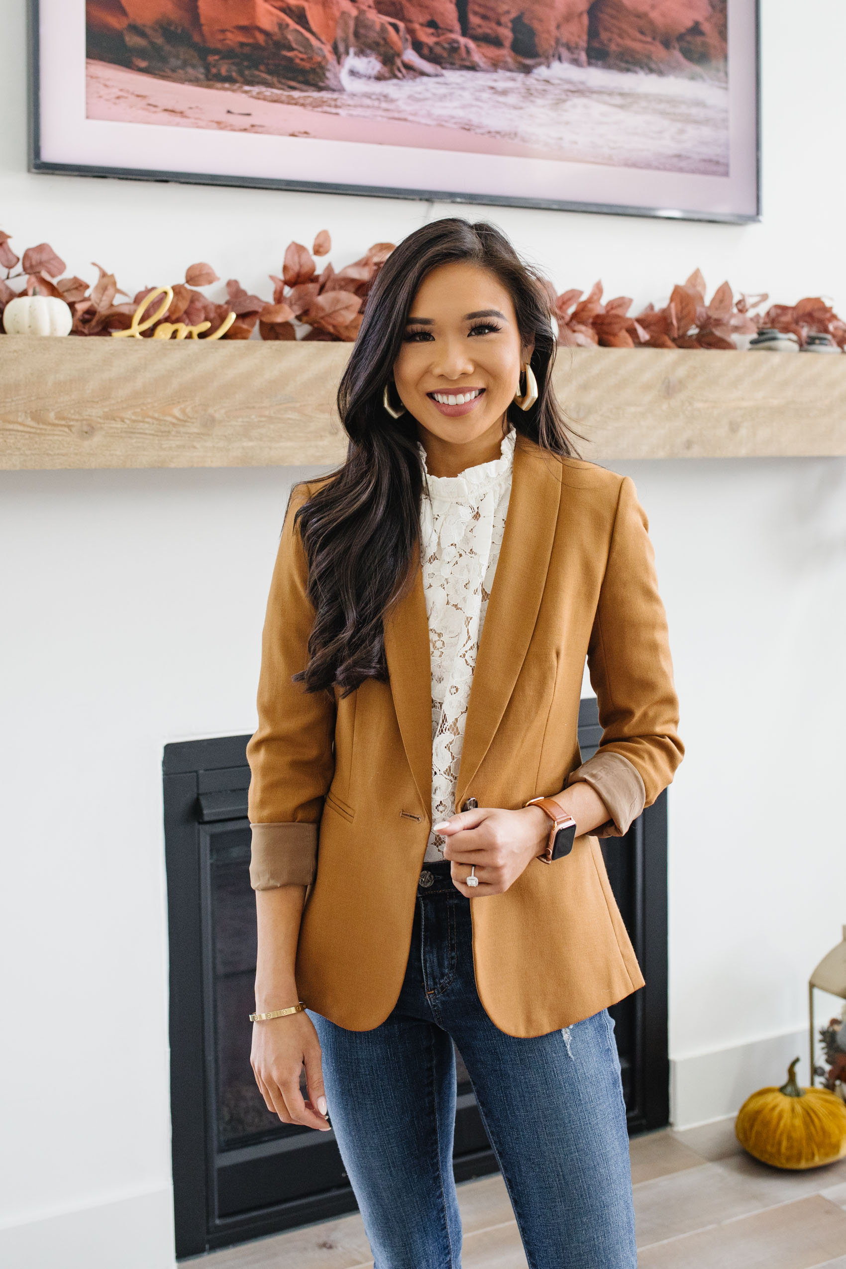 Blogger Hoang-Kim wearing a WAYF lace top, J.Crew Parke blazer, AG Jeans, Kendra Scott earrings for a fall outfit