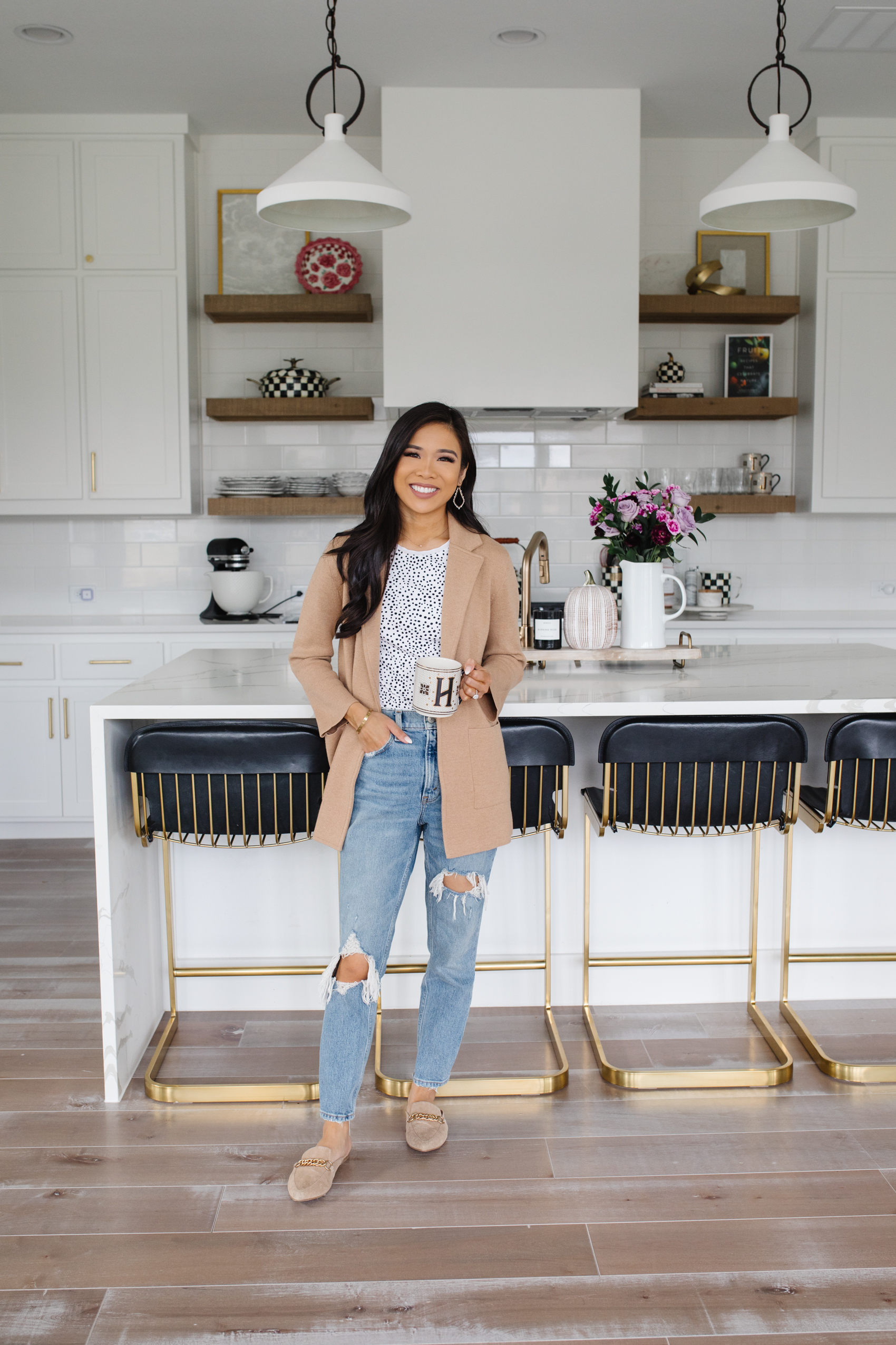 Petite blogger wearing J.Crew Sophie Blazer in Heather Khaki with Abercrombie High Waisted Mom Jeans, White House Black Market spotted tee and Steve Madden mules in her white kitchen with fall decor