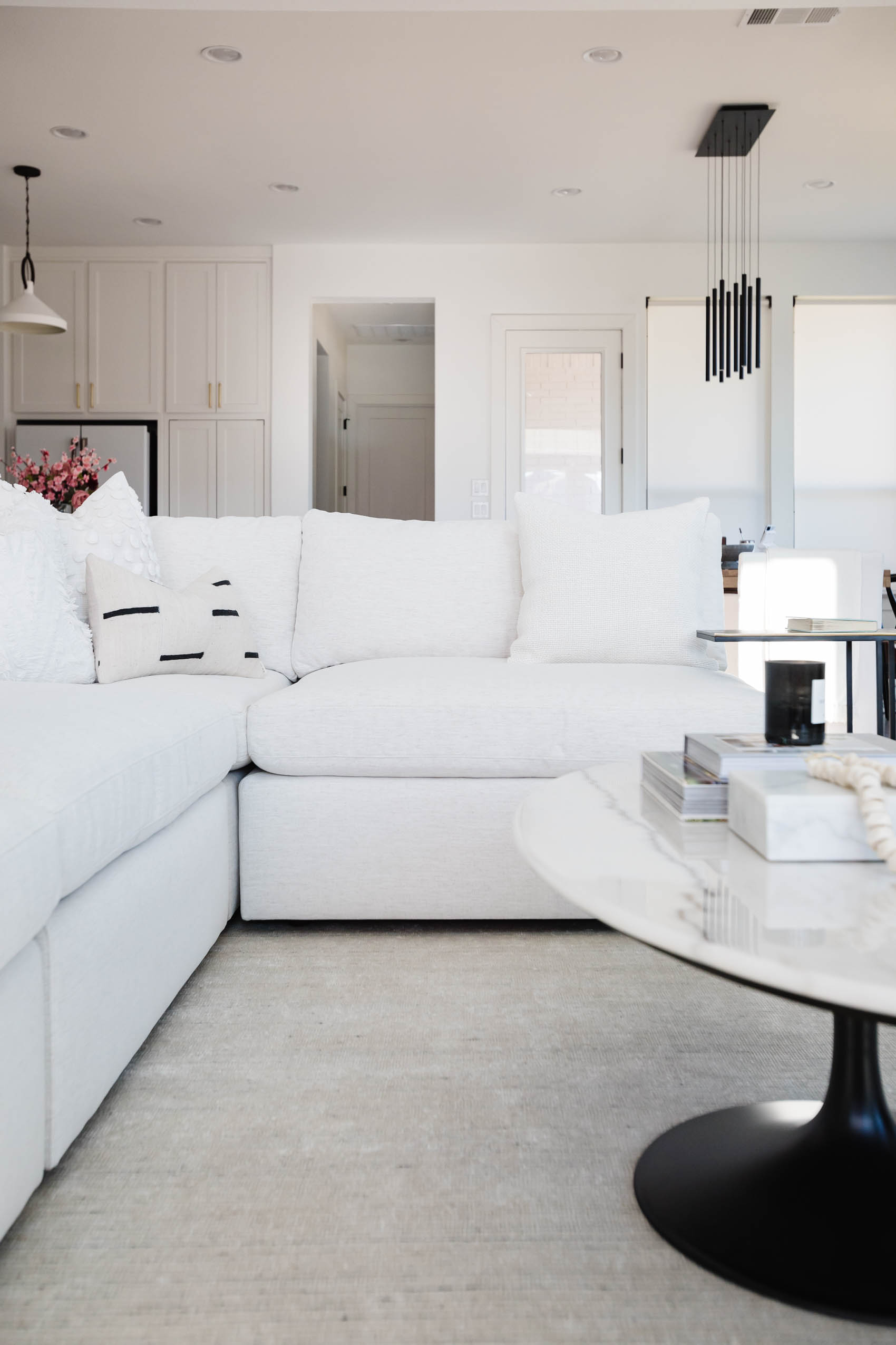 arhaus beale 4-piece sectional, arhaus enzo marble coffee table, blogger Hoang Kim's modern transitional living room reveal, modular sectional, best white sofa