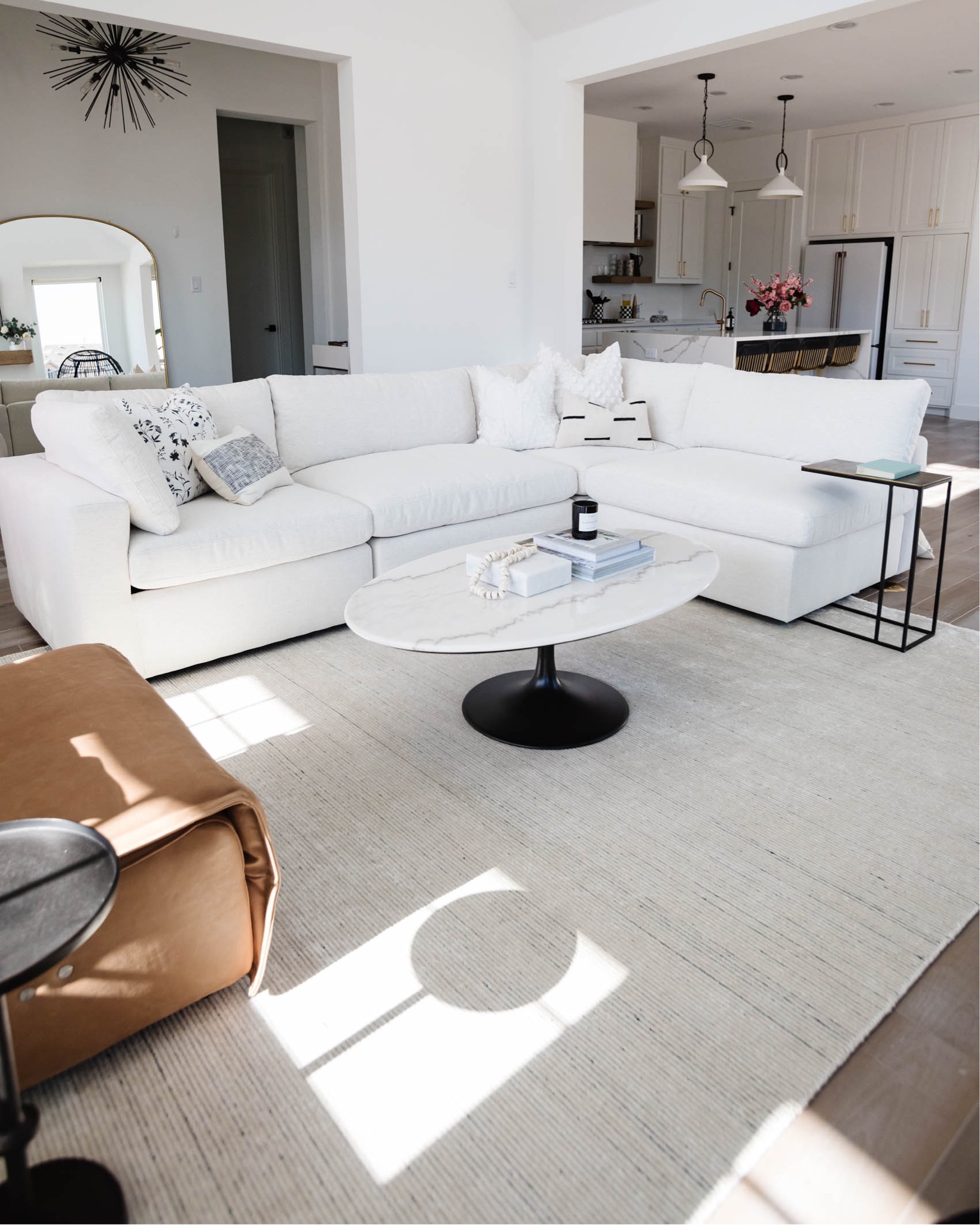 the best modular sectional, the arhaus beale in nomad snow crypton fabric in blogger hoang-kim cung's transitional living room