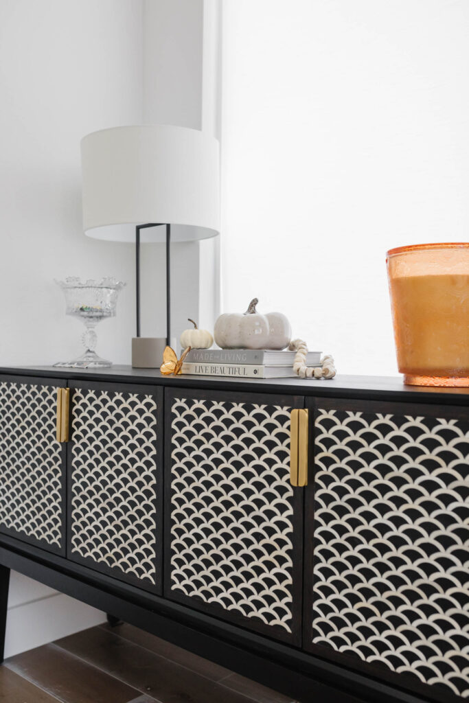 blogger hoang-kim cung shares the best places to buy furniture for transitional style design including arhaus with the raja bar cabinet