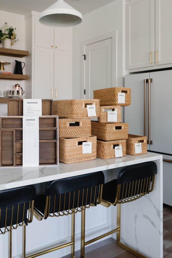 Blogger Hoang-Kim Cung shares pantry organization ideas including rattan baskets and drawer organizers from the Marie Kondo Collection at The Container Store