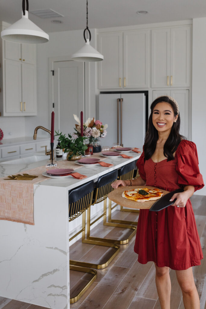 Blogger Hoang-Kim Cung shares her three simple tips for fall tablescapes in her transitional white kitchen in Dallas, TX