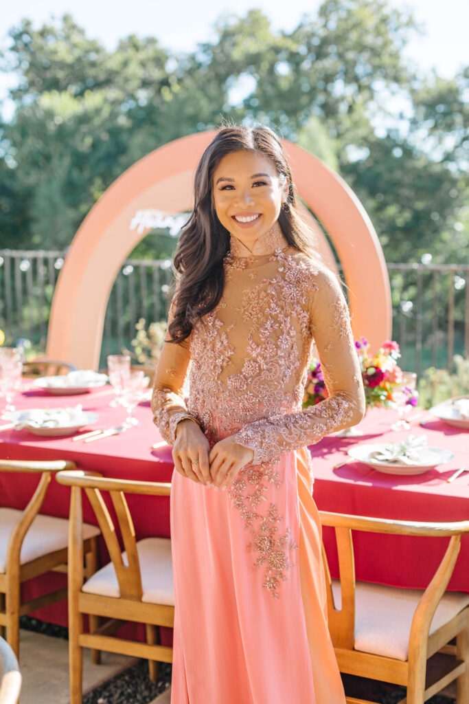 Blogger Hoang-Kim wears a hand-beaded couture ao dai by Thai Nguyen Atelier at her Dam Hoi, a Vietnamese Engagement Party also known as Le Dinh Hon, a Vietnamese wedding tradition