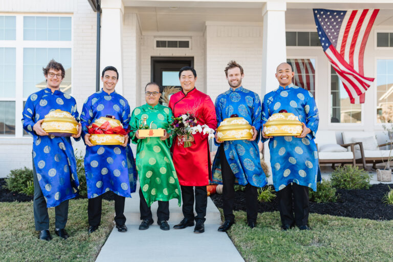 Johnny in a mens ao dai with his groomsmen at his Dam Hoi, a Vietnamese Engagement Party also known as Le Dinh Hon, a Vietnamese wedding tradition