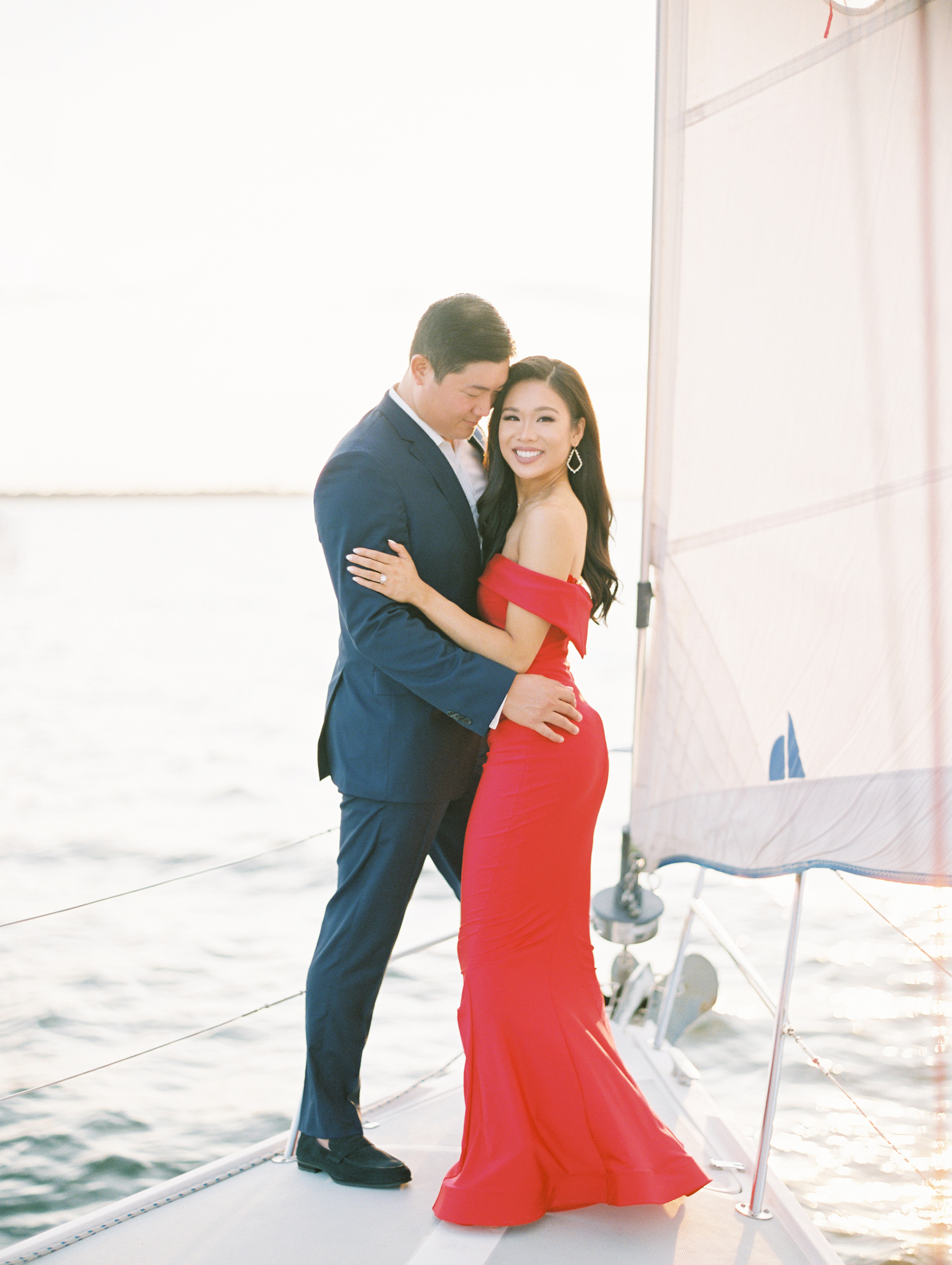 blogger hoang-kim cung shares her engagement shoot outfits from sailboat engagement shoot