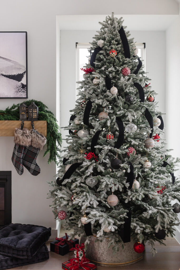 Blogger Hoang-Kim Cung shares her pre-lit Balsam Hill tree and modern Christmas decor from Arhaus in her transitional living room