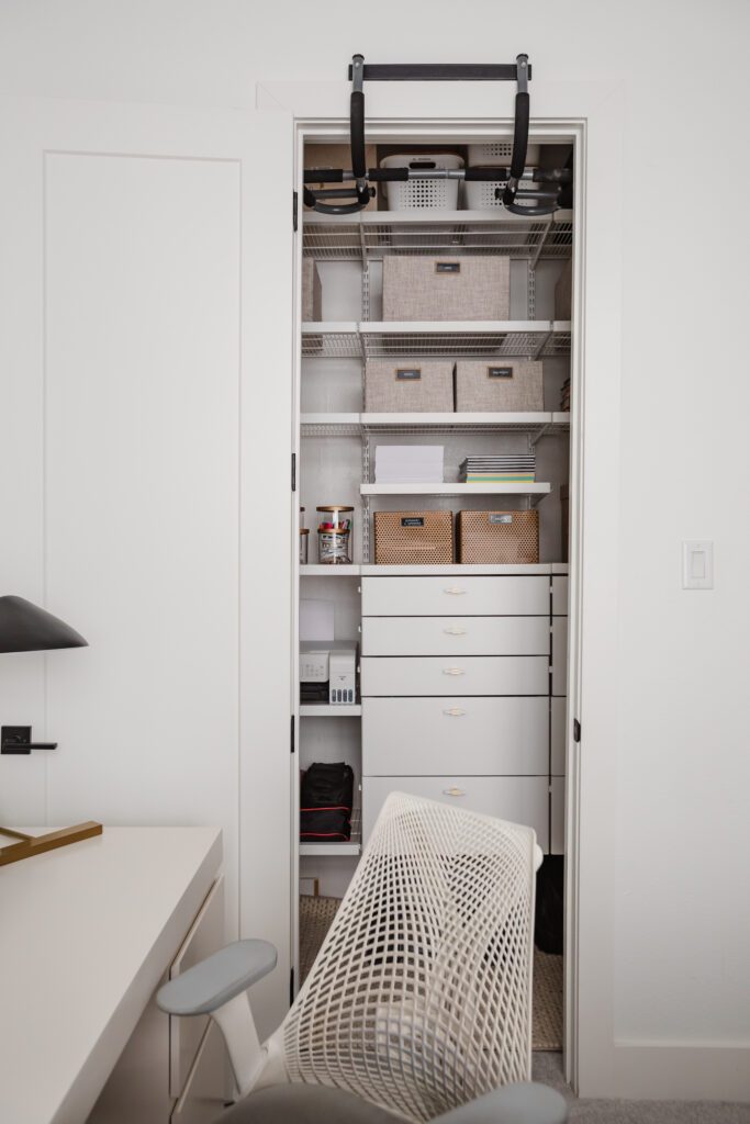 Blogger Hoang-Kim Cung discusses shared home office ideas in her transitional style home including a closet organized by the neat method highland park