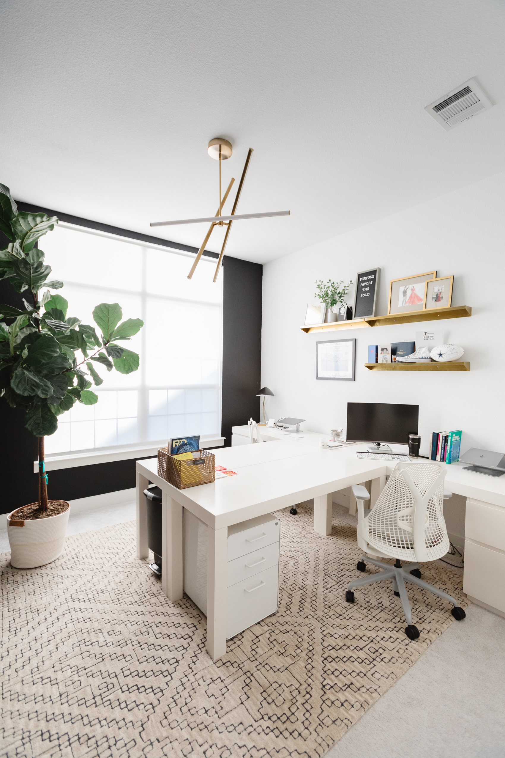Blogger Hoang-Kim Cung discusses shared home office ideas in her transitional style home including west elm parsons l-shaped desks