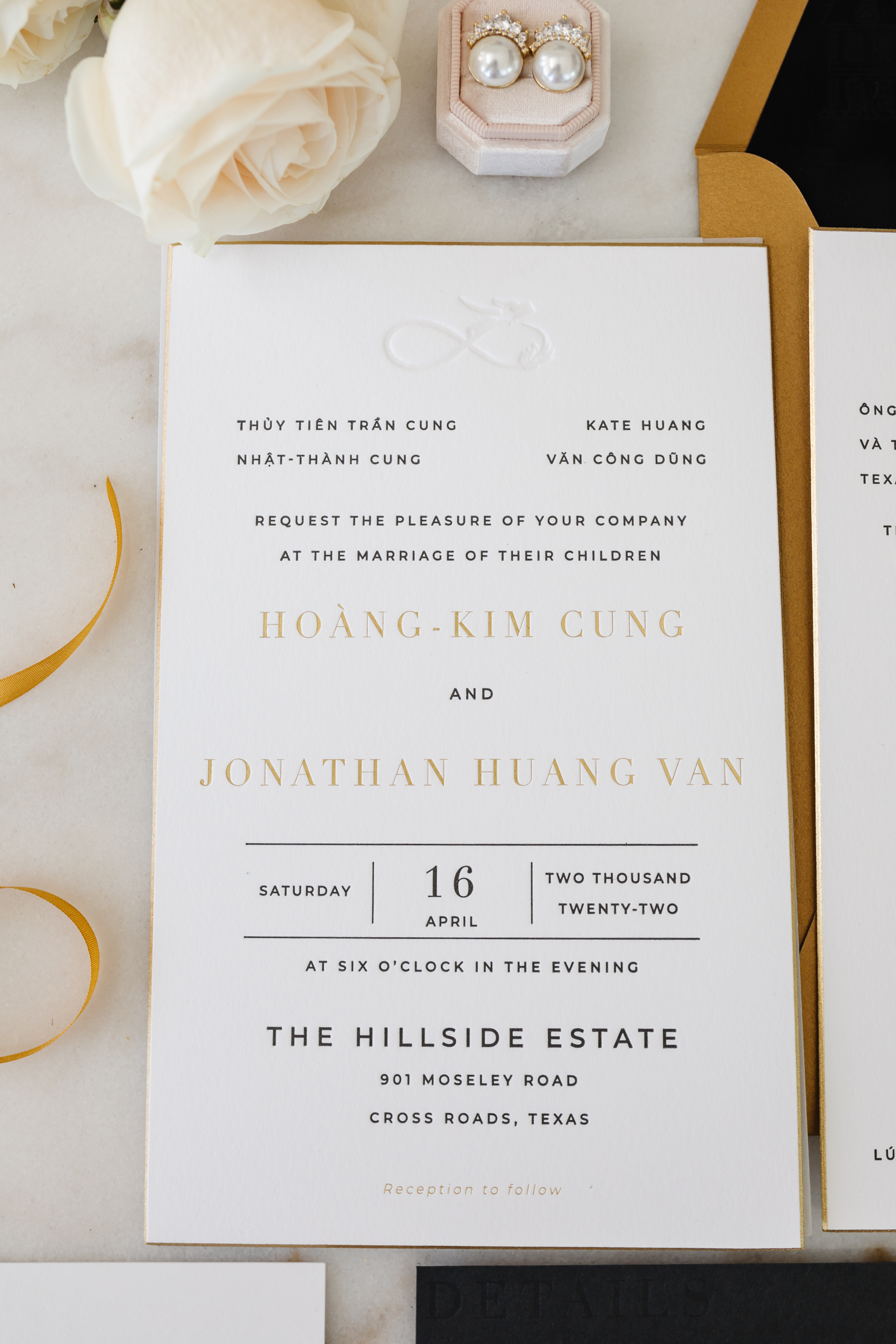 Blogger Hoang-Kim Cung's custom wedding invitations with gold beveled edges and letterpressed text