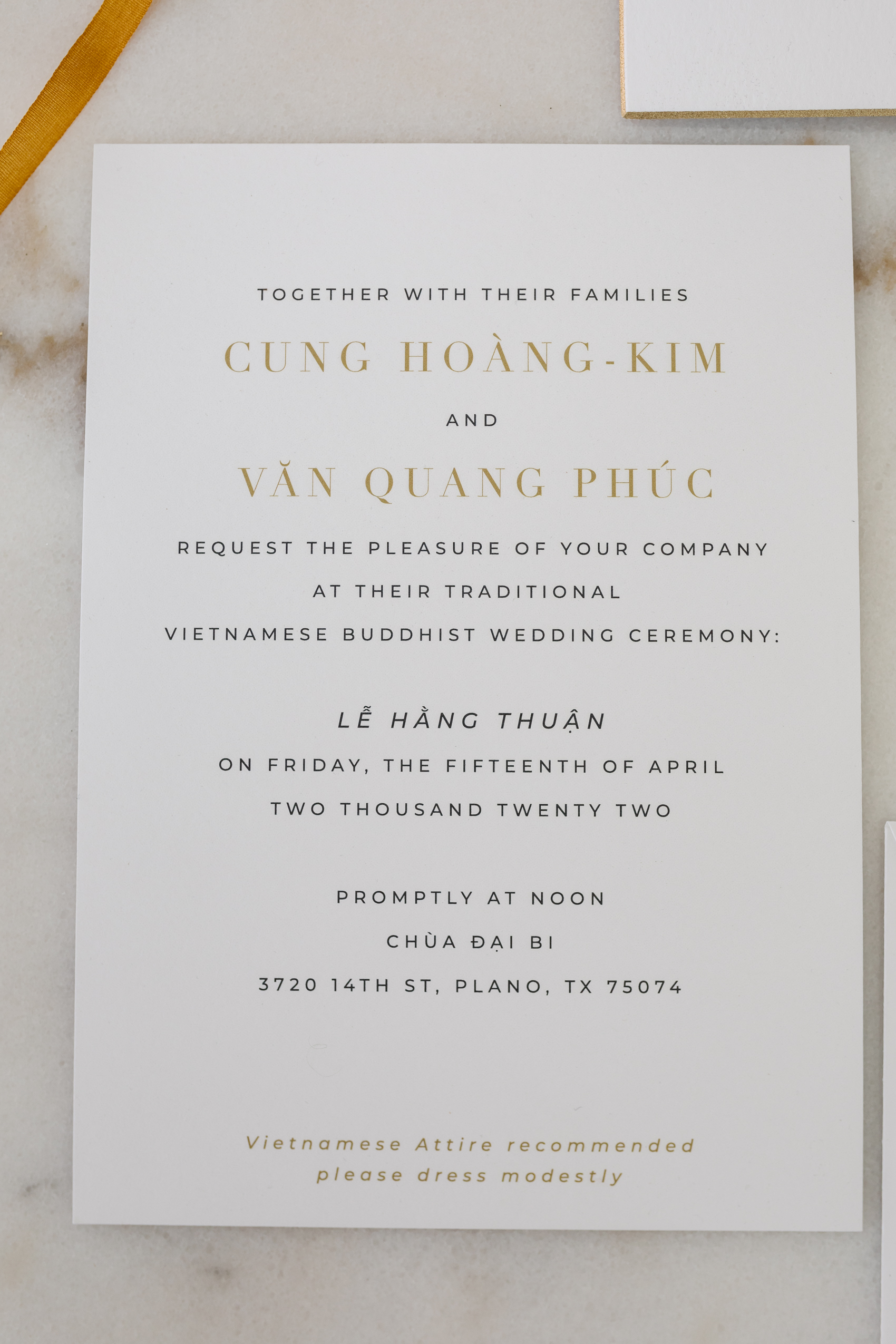 Blogger Hoang-Kim Cung's custom wedding invitations for traditional vietnamese buddhist wedding ceremony with gold beveled edges and letterpressed text