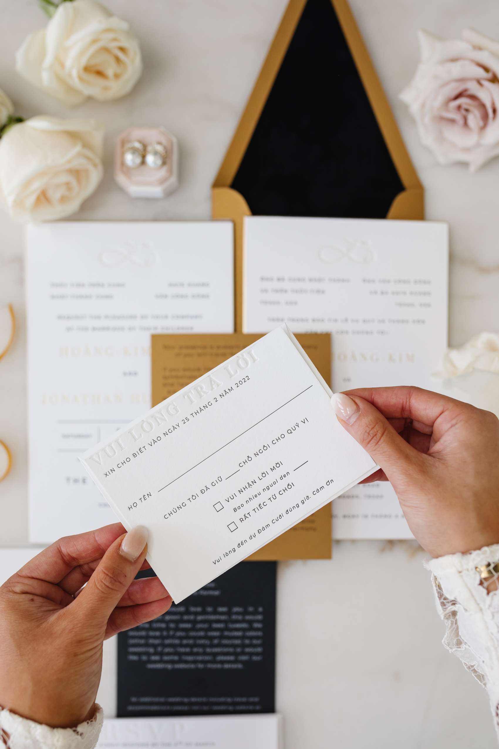 Blogger Hoang-Kim Cung's custom wedding invitations with letterpressed wedding response cards and envelopes