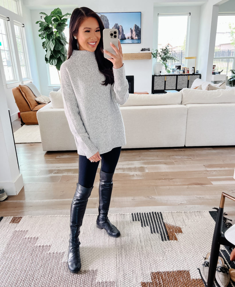 blogger hoang-kim cung shares the best cashmere sweaters, including the vince marled funnel neck wool blend sweater with black leggings and boots
