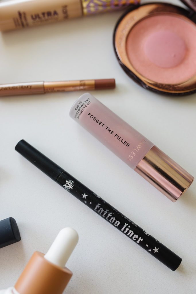 blogger hoang-kim cung reviews the best makeup including kat von d tattoo liquid liner and lawless forget the filler lip plumping gloss