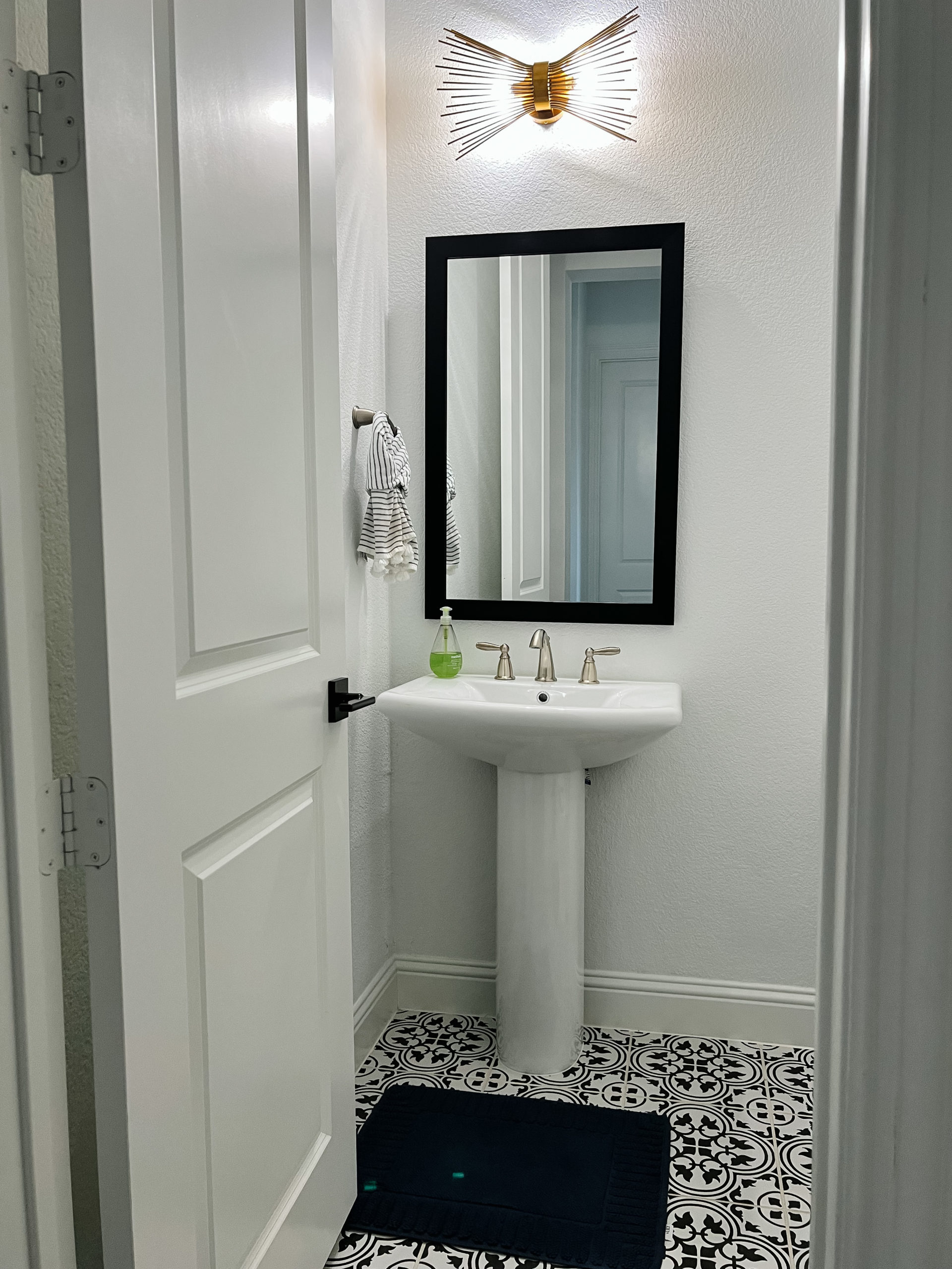 How a Small Bathroom Vanity Transformed this Powder Room